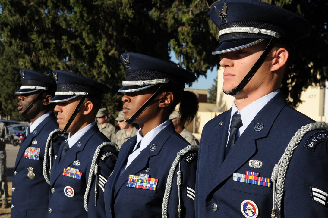 Members of the 39th Air Base Wing Honor Guard stand at attention during a Veterans Day ceremony Nov. 11, 2015, at Incirlik Air Base, Turkey. The ceremony included the playing of taps and closing remarks by Col. John Walker, 39th ABW commander, to pay respect for all veterans who have served past, present and future. (U.S. Air Force photo by Airman 1st Class Daniel Lile/Released)