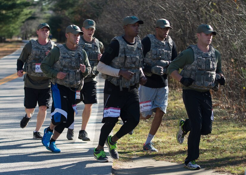 Members of the 66th Security Forces Squadron Special Reaction Team participate in the 4th Annual Jim Thorpe Classic 5K in recognition of Native American Heritage Month Nov. 17. The event pays tribute to Thorpe whom many consider one of the greatest American athletes of all time. He won two gold medals in the 1912 Summer Olympics, played professional baseball for 20 years and played in 52 professional football games during eight seasons. (U.S. Air Force photo by Mark Herlihy)