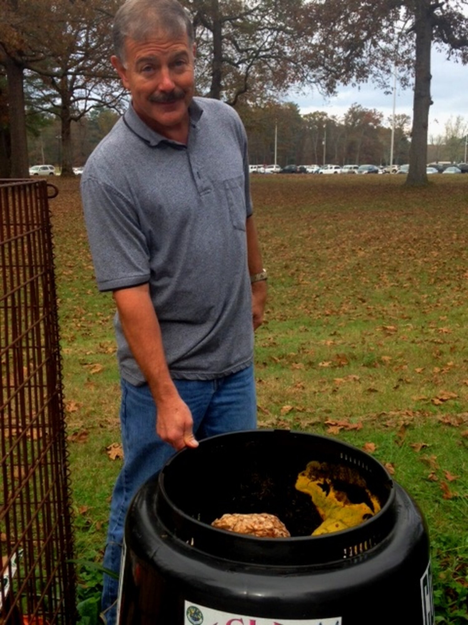 Brent Pewitt, a Green Team captain at AEDC, is pictured here with the compost bin that was found to have slime mold growing in it. Slime mold describes a fungi-like organism that uses spores to reproduce and feeds on the bacteria that grows on dead plant matter. (Photo by Annie Clements)