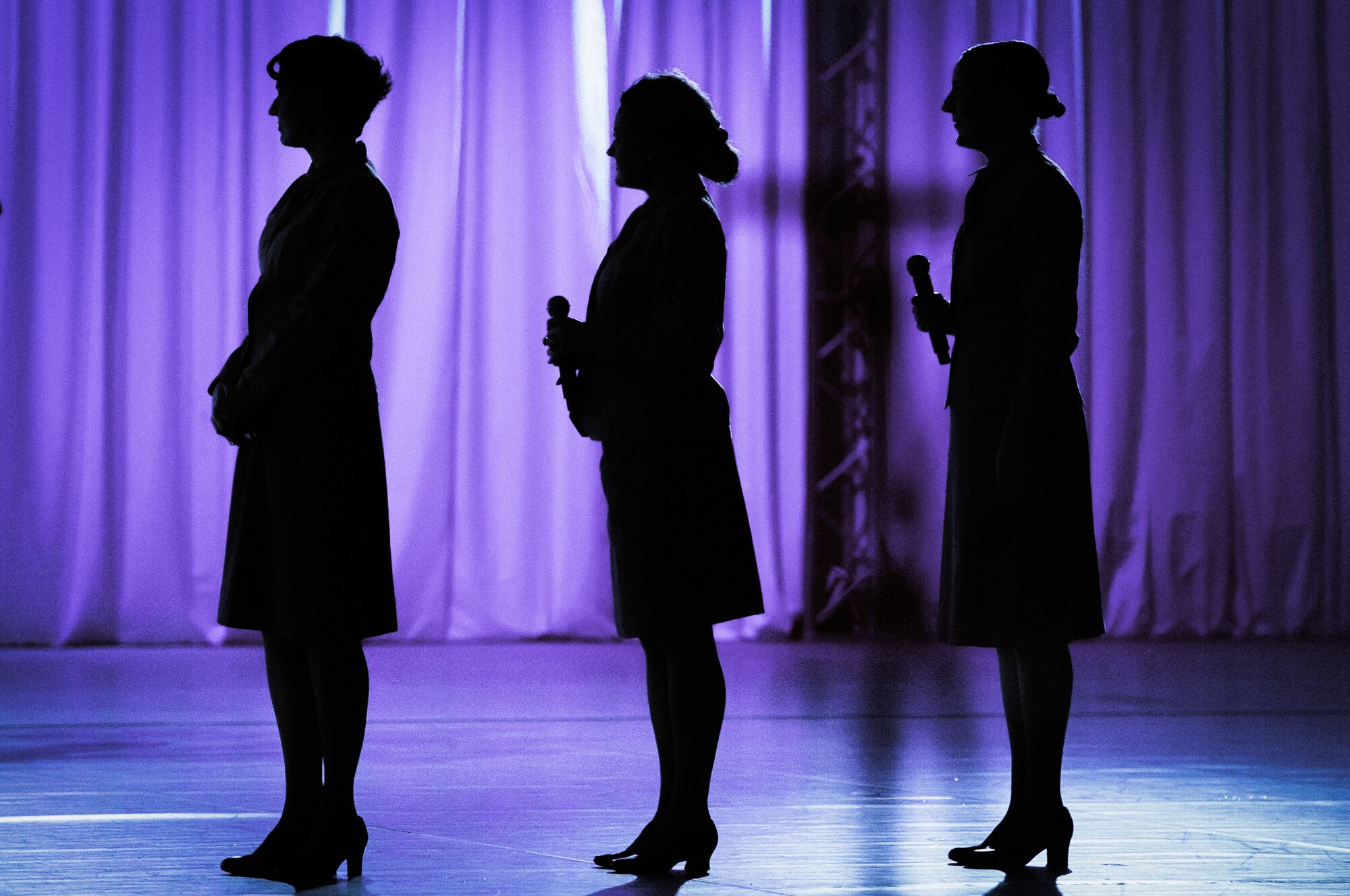 U.S. Air Force Band of the Pacific vocalists Senior Airman Joanne Griffin, left, Master Sgt. Julie Bradley, center, and Senior Airman Rebecca Allen, right, perform at the Japan Self-Defense Force Marching Festival at the Nippon Budokan Arena in Tokyo, Japan, Nov. 13, 2015. By participating in the festival, the band was able to represent their country in front of the local population in the downtown Tokyo region. (U.S. Air Force photo by Airman 1st Class Delano Scott/Released)  