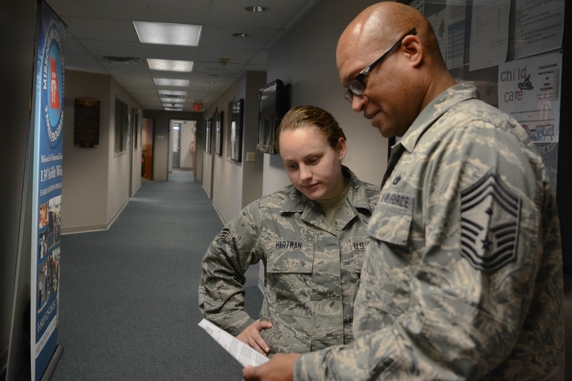 Chief Master Sgt. Joseph Hamlett, first seargent assigned to the 139th Airlif Wing, discusses the key factors in leadership with an airman at Rosecrans Air National Guard Base on Nov. 17, 2015. (U.S. Air National Guard photo by Senior Airman Bruce Jenkins)