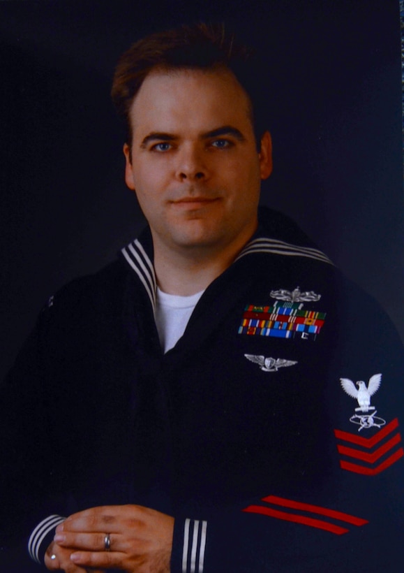This official photo of Stephen Woolverton, now a civilian instructor at the Defense Information School at Fort Meade, Md., was taken approximately five years ago while he was on active duty.