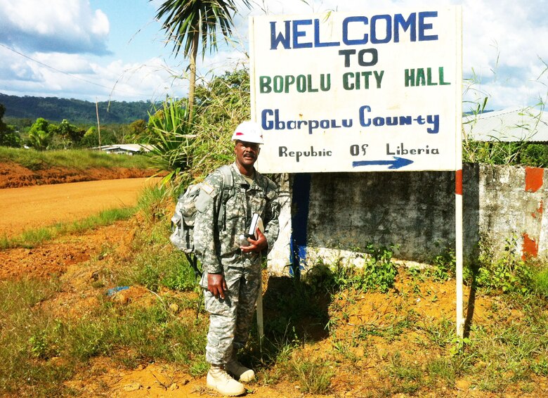New York District civil engineer Milton Ricks outside a government office in northern Liberia (West Africa) during a nine-month deployment helping contain the Ebola virus. The Forward Engineer Support Team - Advanced (FEST-A) was tasked to perform a site survey for possible construction of an Ebola center facility nearby.