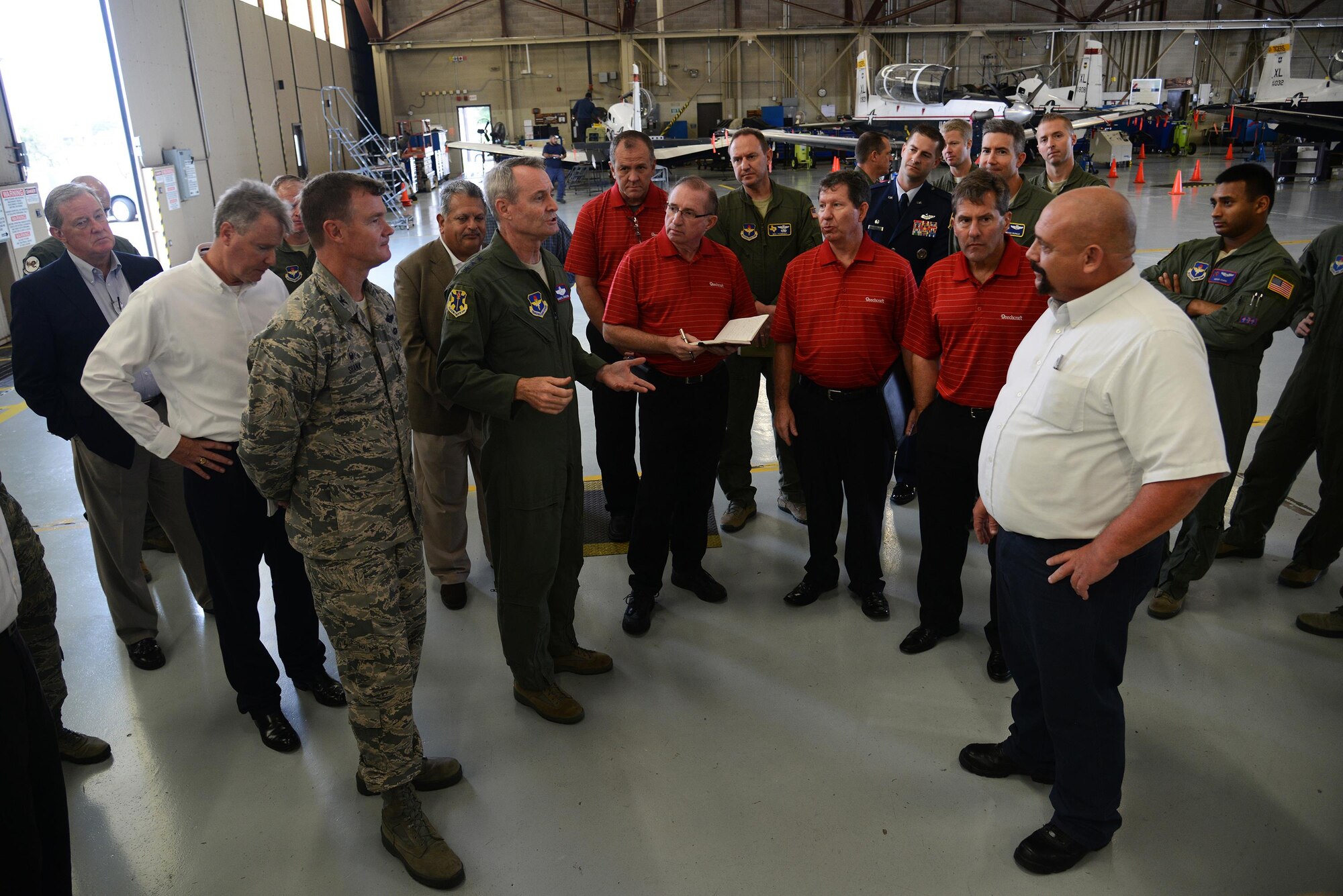 Lt. Gen. Darryl Roberson, commander of Air Education and Training Command, speaks to team members and defense contractors at Laughlin Air Force Base, Texas, Nov. 16, 2015. While at Laughlin, Roberson toured the T-6A Texan II hangar to discuss and observe maintenance operations. (U.S. Air Force photo by Airman 1st Class Ariel D. Partlow)