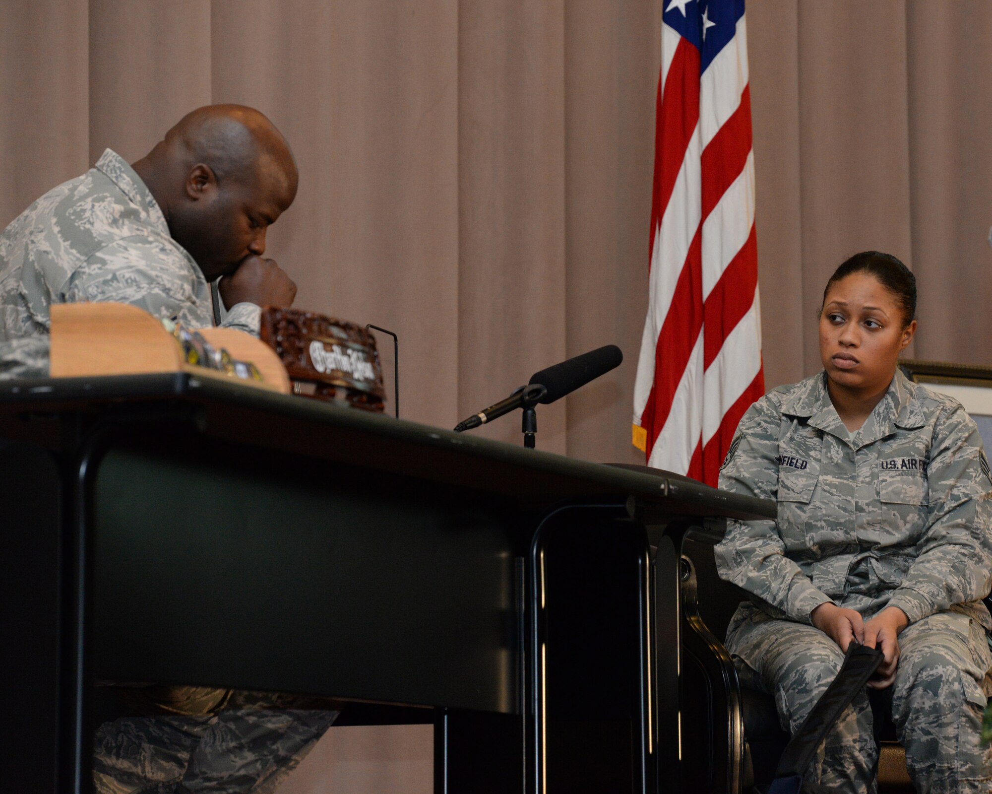 Staff Sgts. Charlton Nelson and Erica Hood, Barksdale Sexual Assault Theater Group actors, perform during the theatrical play “A Day in the Life of a Leader” at Barksdale Air Force Base, La., Nov. 13, 2015. The play was designed for entertainment and awareness of situations leaders may encounter. (U.S. Air Force photo/ Senior Airman Jannelle Dickey)