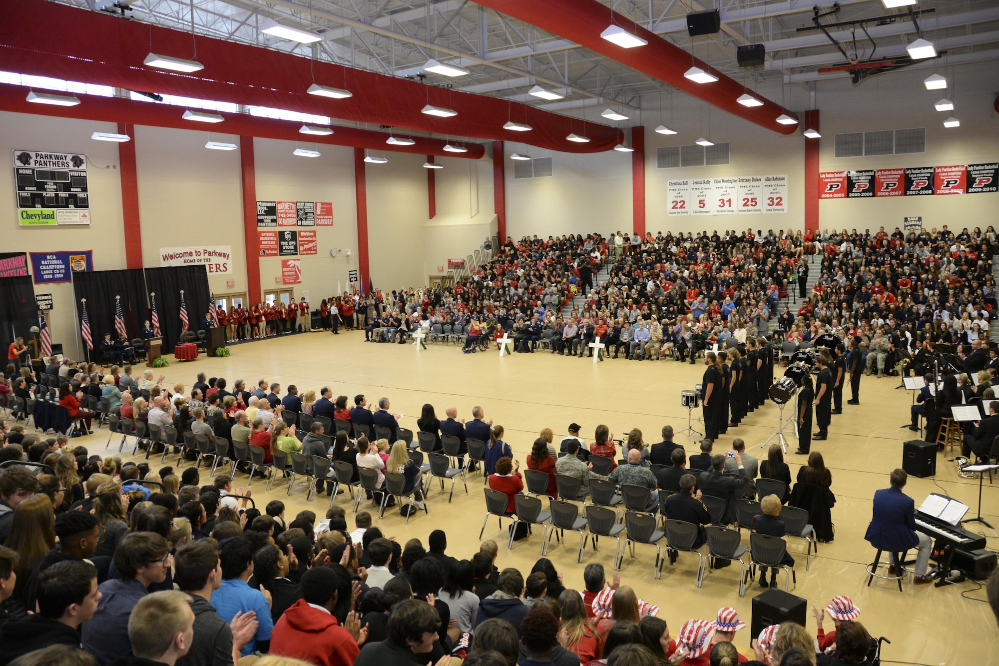 Military veterans, Parkway High School students and the local community gather for Parkway’s annual Veterans Day Tattoo Ceremony at Parkway High School in Bossier City, La., Nov. 11, 2015. Three members from Barksdale Air Force Base attended as guests of honor to be recognized for their roles in Operation Senior Surprise, a previous classified mission that helped kick off Operation Desert Storm. (U.S. Air Force photo/Senior Airman Amanda Morris) 