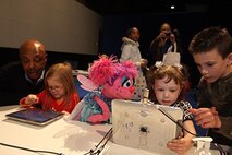 The Sesame Street for Military Families website features beloved Sesame Street characters to help preschool military children cope with military life challenges, such as the deployment of a parent, moving to a new home, and the injury or even death of a parent. [(c) 2011 Sesame Workshop by Evy Mages, photo republished with permission].