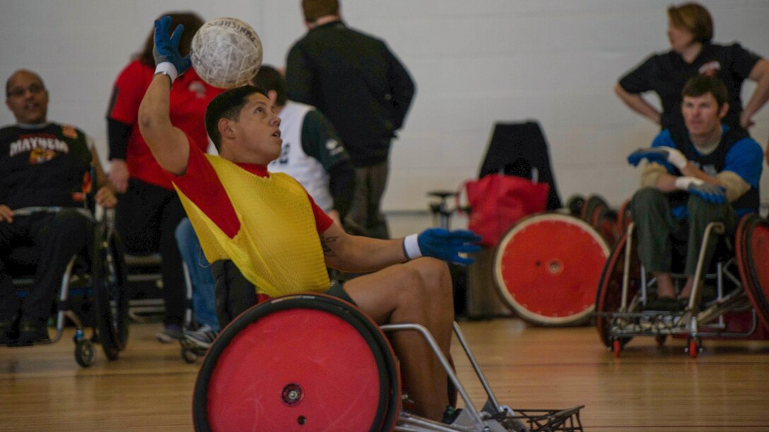 Service members participated in the Joint Service Wheelchair Rugby Exhibition at the West Fitness Center on Joint Base Andrews, Md., as part of Warrior Care Month, Nov. 16, 2015. The exhibition started with a demonstration match between two professional wheelchair rugby teams. Following the opening match, service members from the Marine Corps, Air Force and Army were divided into four teams: Big Red, Bruisers, Cherry Pickas, and Spartans. The Cherry Pickas won the one-day exhibition tournament.