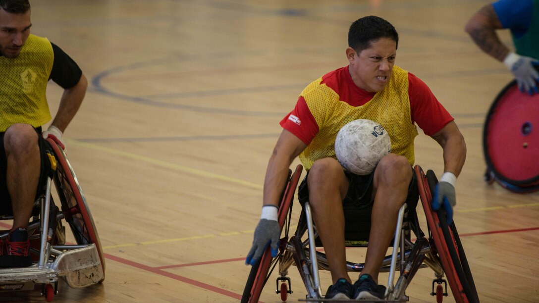 Service members participated in the Joint Service Wheelchair Rugby Exhibition at the West Fitness Center on Joint Base Andrews, Md., as part of Warrior Care Month, Nov. 16, 2015. The exhibition started with a demonstration match between two professional wheelchair rugby teams. Following the opening match, service members from the Marine Corps, Air Force and Army were divided into four teams: Big Red, Bruisers, Cherry Pickas, and Spartans. The Cherry Pickas won the one-day exhibition tournament.