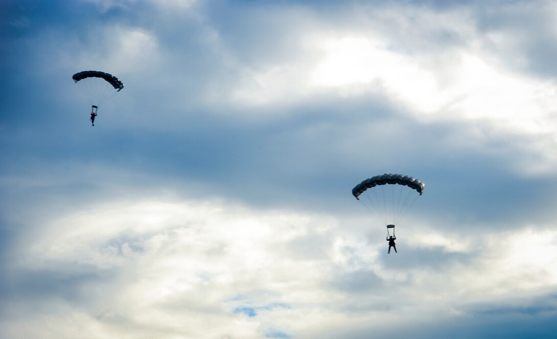 Special operation forces members descend into the Gulf of Mexico during Maritime Craft Aerial Delivery Systems (MCADS) training, Nov. 12, 2015. MCADS enable special operation forces members to rapidly deploy anywhere around the world in a maritime environment. (U.S. Air Force photo by Senior Airman Meagan Schutter)