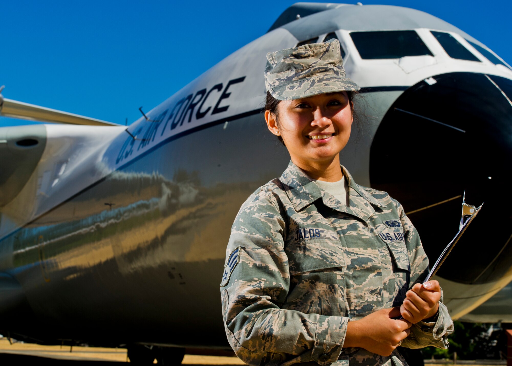 Air Force Reserve Senior Airman Anne Venice Jalos, a 446th Airlift Wing finance manager, stands in Heritage Park at McChord Field, Wash., Aug. 7, 2015. Jalos became a U.S. citizen after completing Air Force basic military training. (U.S. Air Force Reserve photo/Senior Airman Daniel Liddicoet)