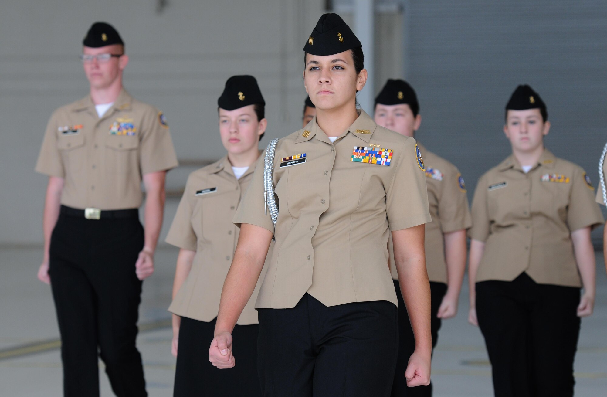 Cadet Brandy Gentry, Neshoba Central High School Navy Junior ROTC, Philadelphia, Miss., leads her team in the unarmed exhibition during the second annual Mississippi All-Services Junior ROTC Drill Competition Nov. 14, 2015, at Keesler Air Force Base, Miss. Seventeen Junior ROTC teams from all military branches were represented at the event. Approximately 800 Junior ROTC cadets and spectators were in attendance where cadets battled for the best all-services Junior ROTC team in Mississippi. Neshoba Central High School Navy Junior ROTC earned the top honors. (U.S. Air Force photo by Kemberly Groue)
