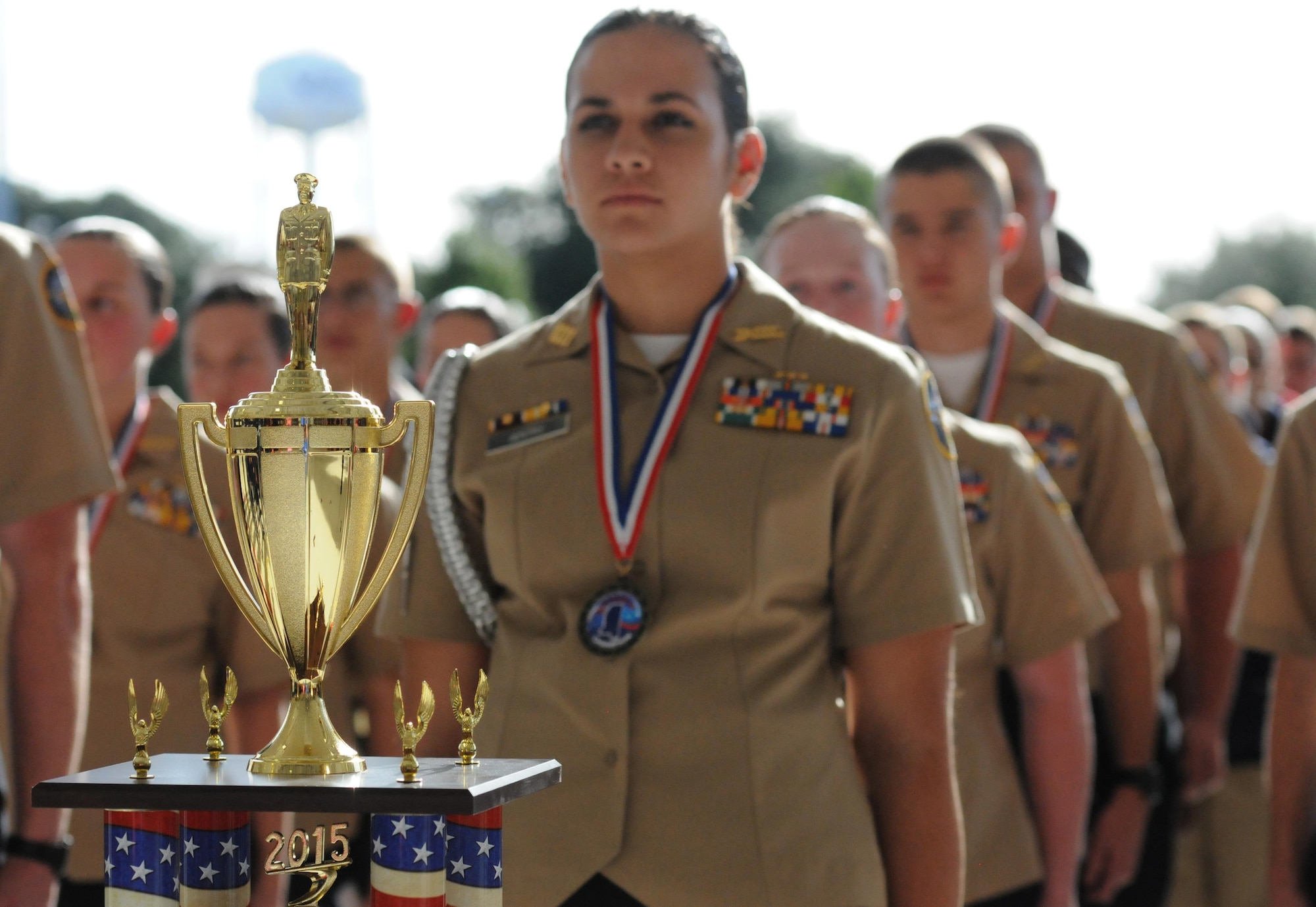 Cadet Brandy Gentry, Neshoba Central High School Navy Junior ROTC, Philadelphia, Miss., stands in formation with her team during the second annual Mississippi All-Services Junior ROTC Drill Competition Nov. 14, 2015, at Keesler Air Force Base, Miss. Seventeen Junior ROTC teams from all military branches were represented at the event. Approximately 800 Junior ROTC cadets and spectators were in attendance where cadets battled for the best all-services Junior ROTC team in Mississippi. Neshoba Central High School Navy Junior ROTC earned the top honors. (U.S. Air Force photo by Kemberly Groue)