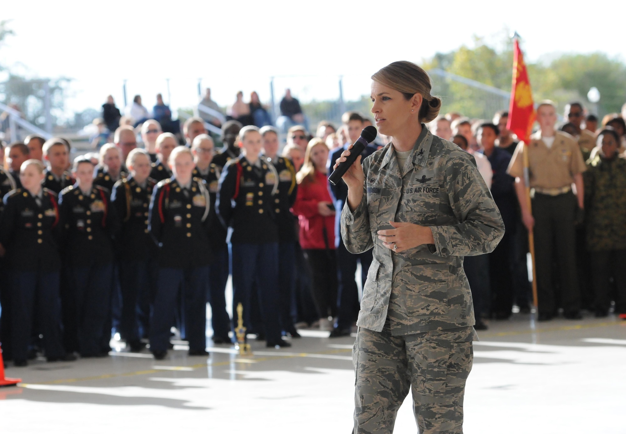 Col. Michele Edmondson, 81st Training Wing commander, delivers closing remarks during the second annual Mississippi All-Services Junior ROTC Drill Competition Nov. 14, 2015, at Keesler Air Force Base, Miss. Seventeen Junior ROTC teams from all military branches were represented at the event. Approximately 800 Junior ROTC cadets and spectators were in attendance where cadets battled for the best all-services Junior ROTC team in Mississippi. Recruiting booths and static displays, including military vehicles, equipment and an aircraft were available to the cadets throughout the competition. (U.S. Air Force photo by Kemberly Groue)