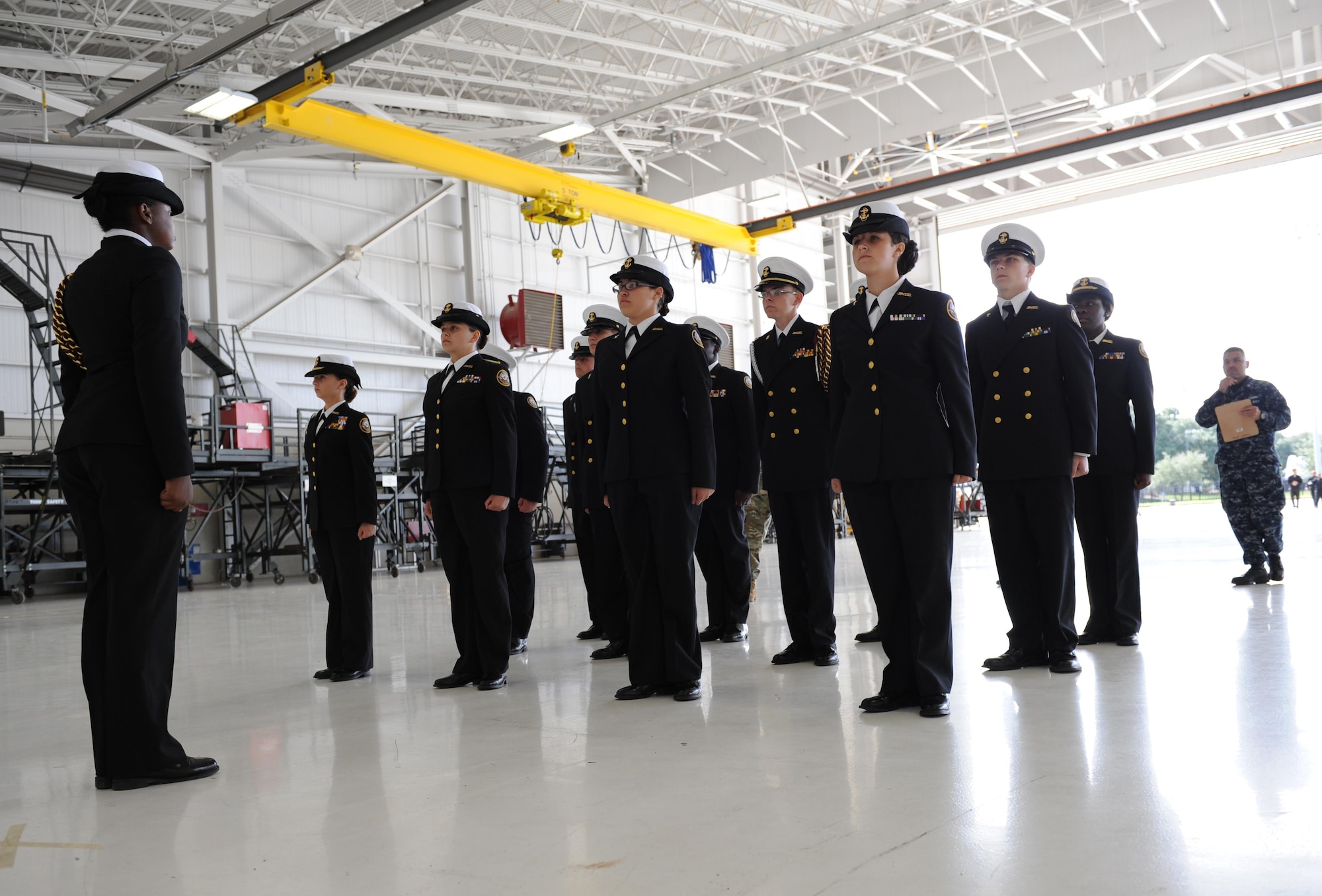 Navy Junior ROTC cadets from Picayune High School, Picayune, Miss., perform a routine in the unarmed regulation during the second annual Mississippi All-Services Junior ROTC Drill Competition Nov. 14, 2015, at Keesler Air Force Base, Miss. Seventeen Junior ROTC teams from all military branches were represented at the event. Approximately 800 Junior ROTC cadets and spectators were in attendance where cadets battled for the best all-services Junior ROTC team in Mississippi. (U.S. Air Force photo by Kemberly Groue)