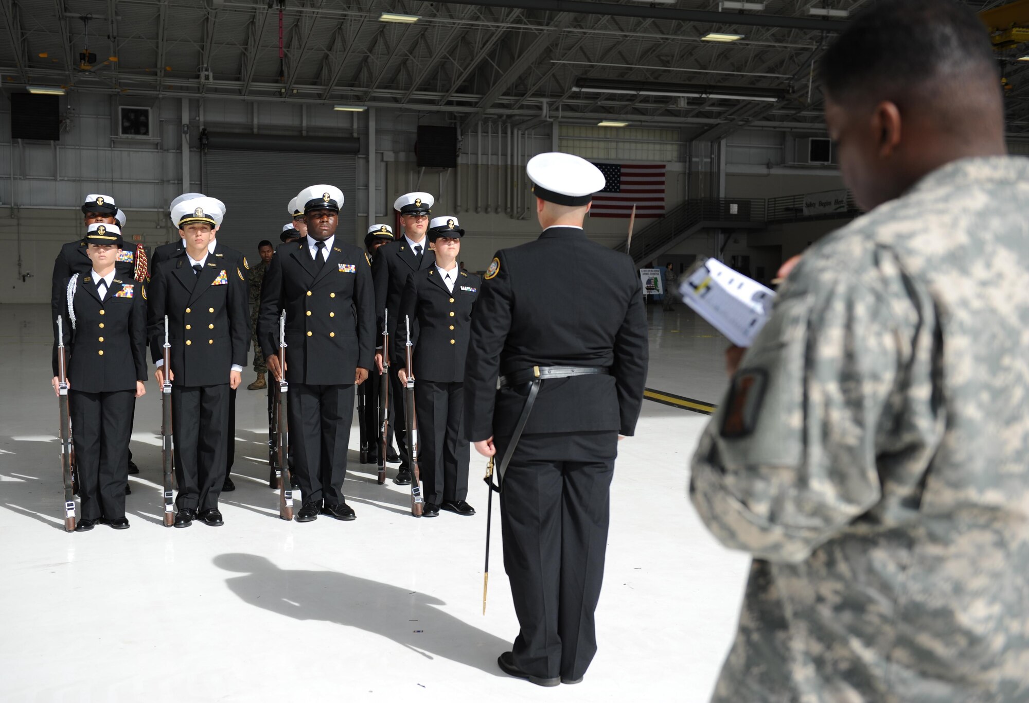 Navy Junior ROTC cadets from Picayune High School, Picayune, Miss., perform a routine in the armed regulation during the second annual Mississippi All-Services Junior ROTC Drill Competition Nov. 14, 2015, at Keesler Air Force Base, Miss. Seventeen Junior ROTC teams from all military branches were represented at the event. Approximately 800 Junior ROTC cadets and spectators were in attendance where cadets battled for the best all-services Junior ROTC team in Mississippi. (U.S. Air Force photo by Kemberly Groue)