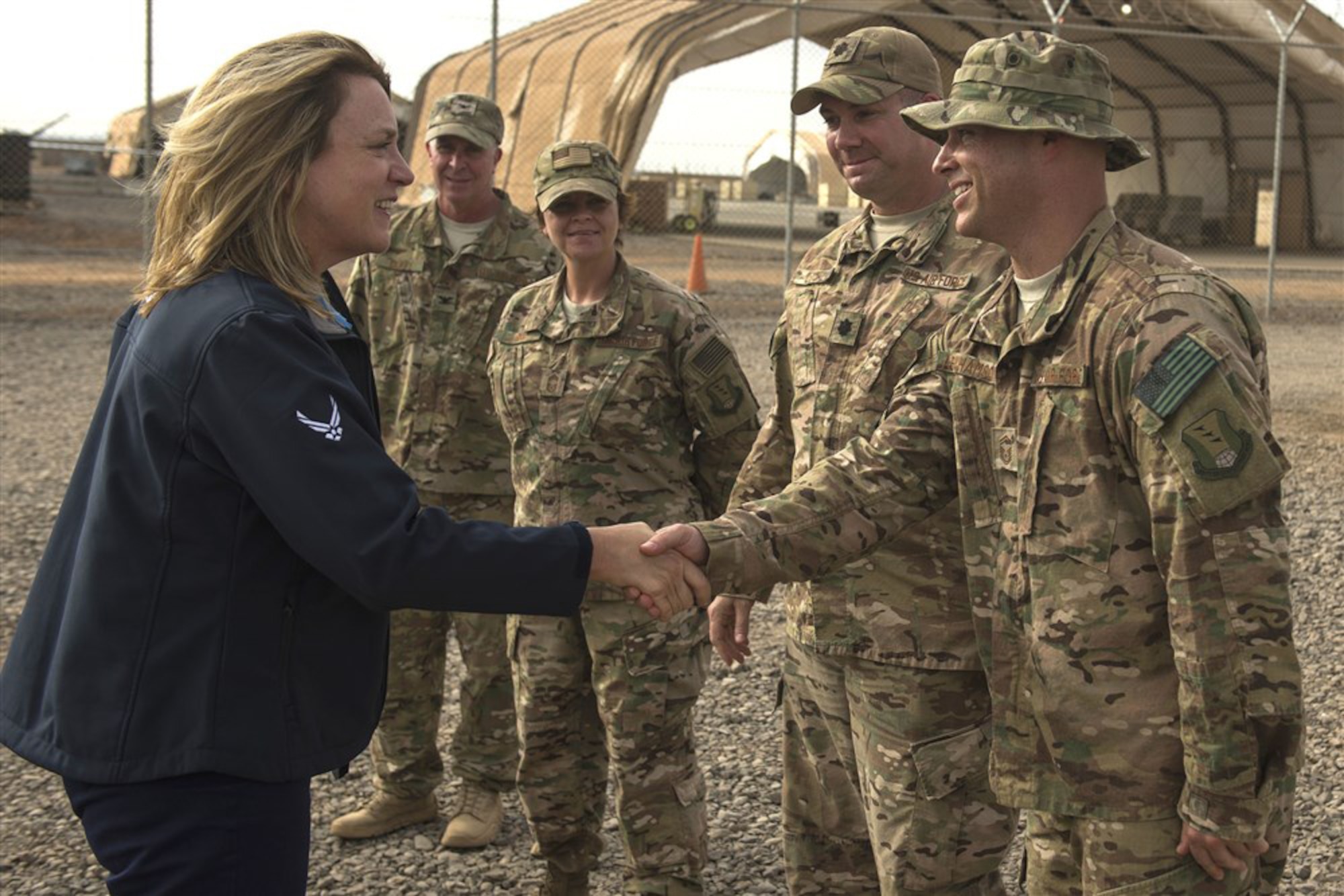 Secretary of the Air Force Deborah Lee James greets Chebelley Airfield leadership Nov. 12, 2015, in Djibouti. During her visit to Chebelley and Camp Lemonnier, James interacted with Airmen across a wide spectrum of career fields as she learned about the critical operations in each location. (U.S. Air Force photo/Senior Airman Peter Thompson)