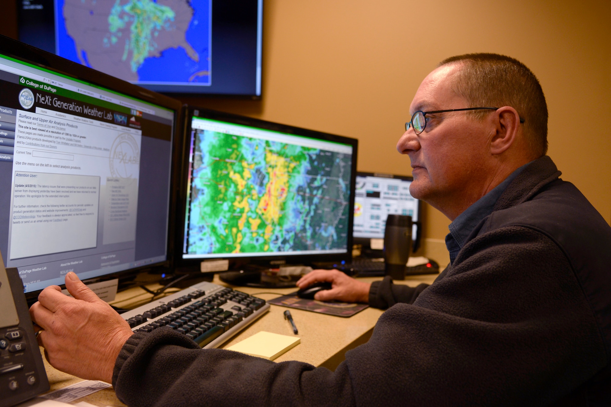Lorne McClard, 2nd Operations Support Squadron meteorological technician, monitors severe weather approaching Barksdale Air Force Base, La., Nov. 17, 2015. During inclement weather, Airmen of the 2nd OSS provide pilots with up-to-the-minute updates allowing them to accomplish daily training. (U.S. Air Force photo/Tech. Sgt. Marie Brown)