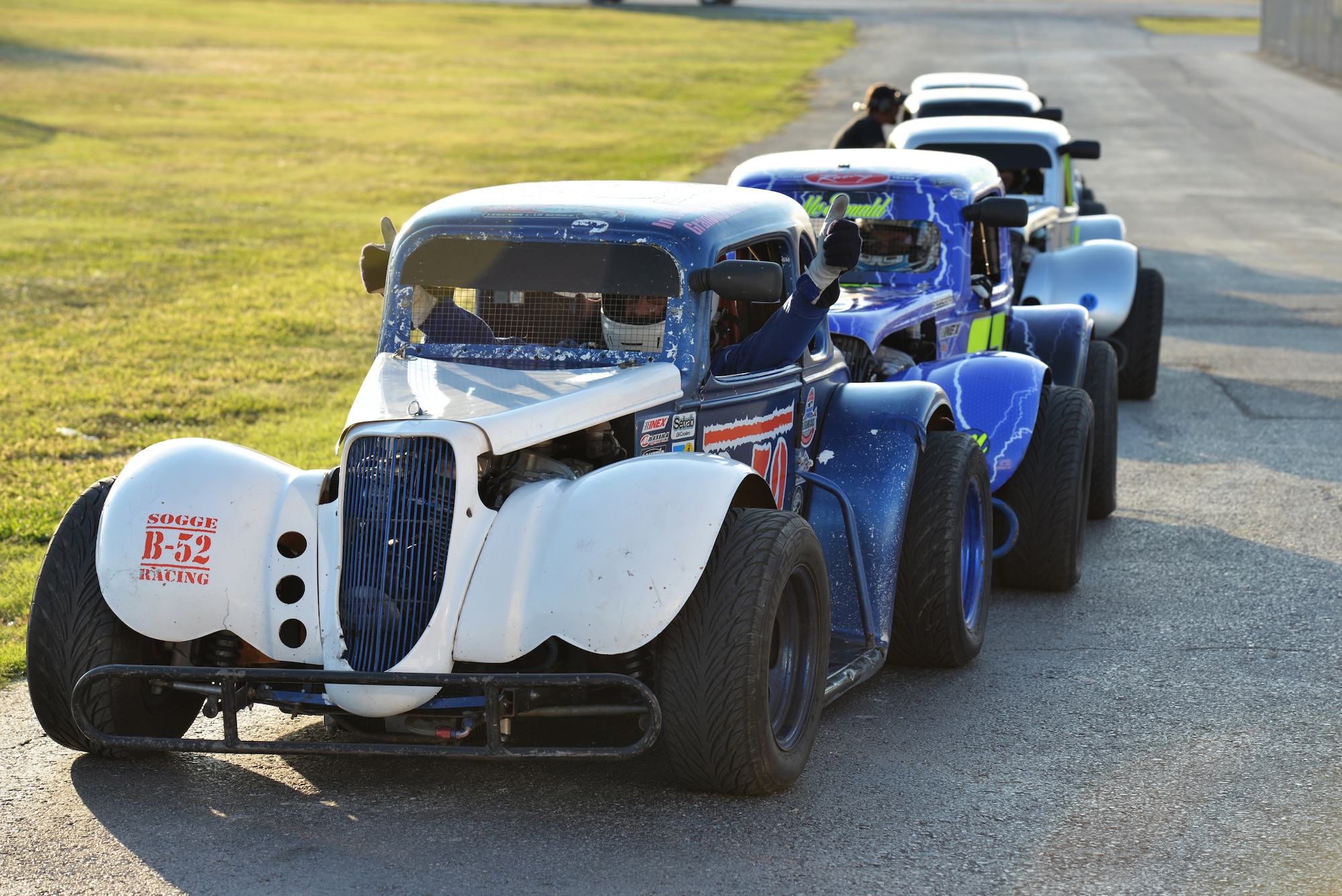 Tech. Sgt. Cameron Sogge, 82nd Training Group unit deployment manager and B-52 Stratofortress maintainer, waits in his B-52 legend car before entering the track to race in the Legends Semi-Pro Championship at the Texas Motor Speedway in Fort Worth, Texas, Oct. 3, 2015. This was Sogge’s first championship race and win while racing his B-52 legend car. (U.S. Air Force photo/Senior Airman Kyle Gese)
