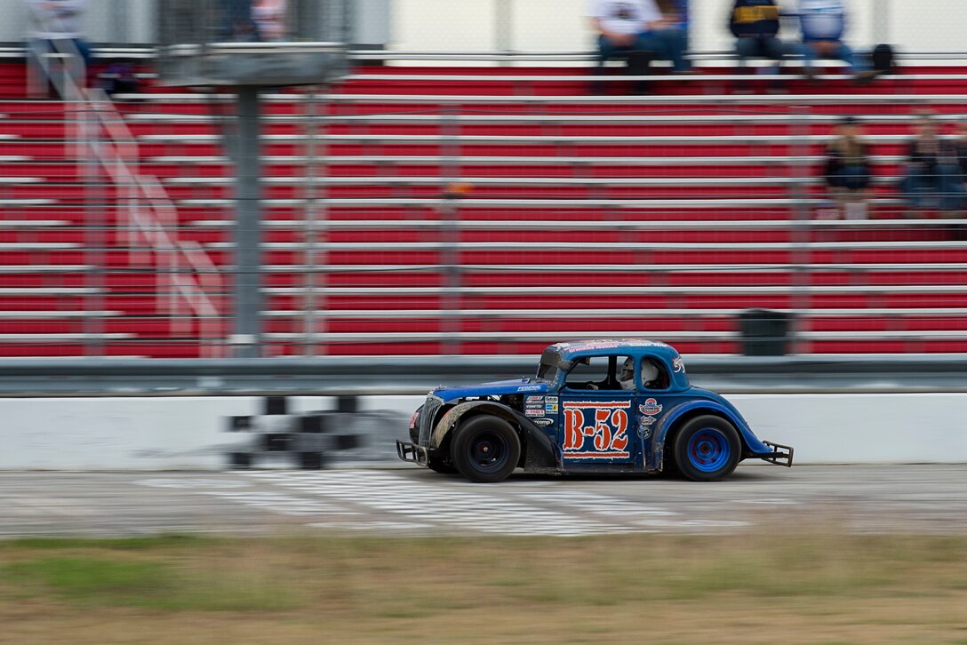 Tech. Sgt. Cameron Sogge, 82nd Training Group unit deployment manager and B-52 Stratofortress maintainer, finishes a race prior to receiving his Legends Semi-Pro Championship trophy at the Texas Motor Speedway in Fort Worth, Texas, Nov. 6, 2015. Sogge attended a banquet after the race with the other drivers to accept their trophies and watch the NASCAR truck race. (U.S. Air Force photo/Senior Airman Kyle Gese)