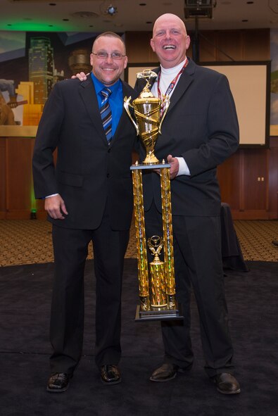 Tech. Sgt. Cameron Sogge, 82nd Training Group unit deployment manager and B-52 Stratofortress maintainer, accepts his Legends Semi-Pro Championship trophy during the awards banquet at the Texas Motor Speedway in Fort Worth, Texas, Nov. 6, 2015. This was Sogge’s first championship win, competing in the semi-pro championship. (U.S. Air Force photo/Senior Airman Kyle Gese)