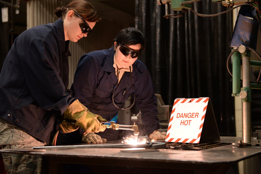 Airmen experience welding and other metallurgy practices during the Immersion program tour at Luke, Nov. 13, 2015. (U.S. Air Force photo by Airman 1st Class Ridge Shan)