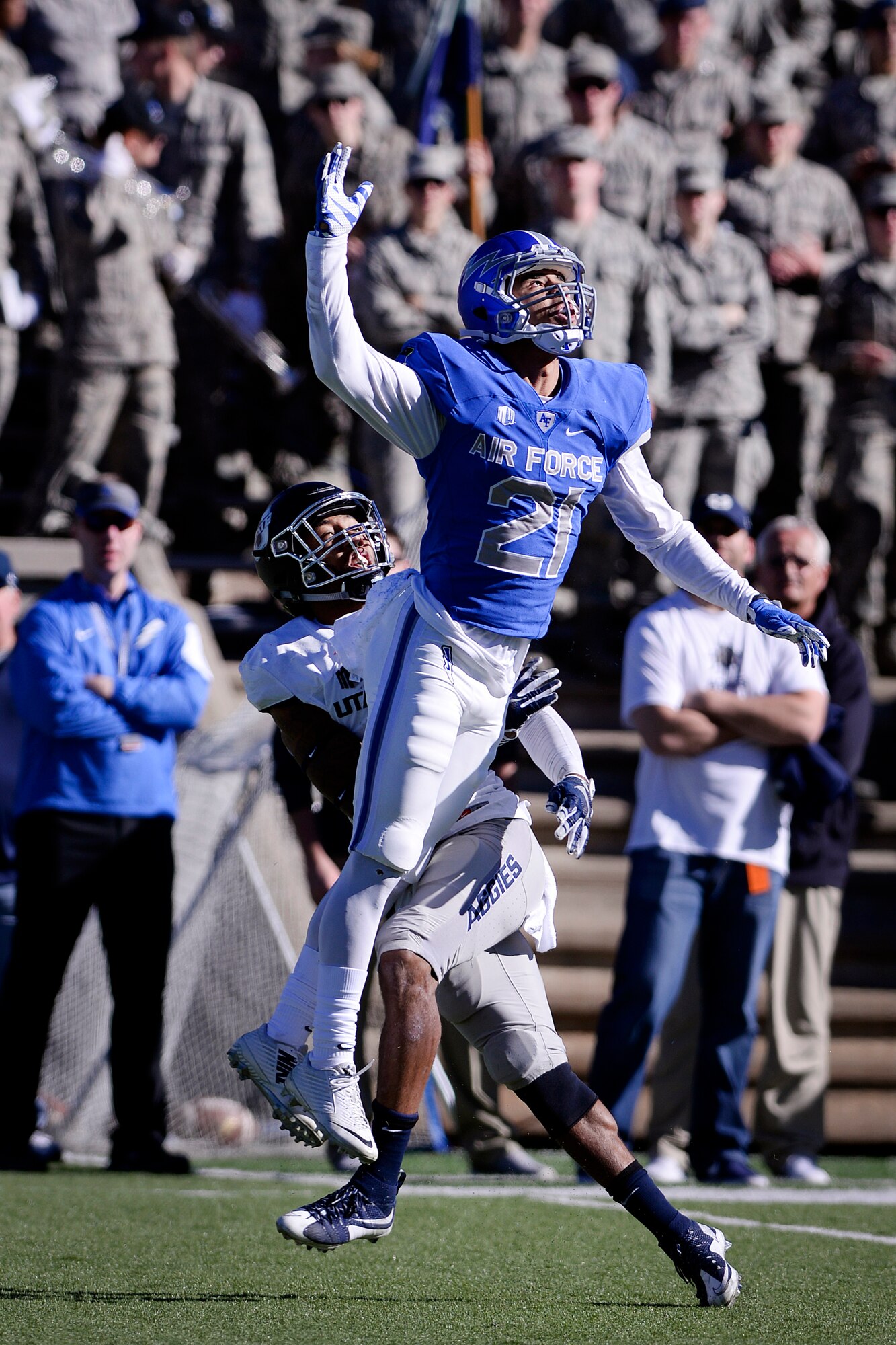 Falcon cornerback Jesse Washington goes airborne to defend a pass against Utah State, Nov. 14, 2015 at Falcon Stadium. Air Force beat the Aggies 35-28 to advance to 7-3 in the year. (U.S. Air Force photo/Mike Kaplan)  
