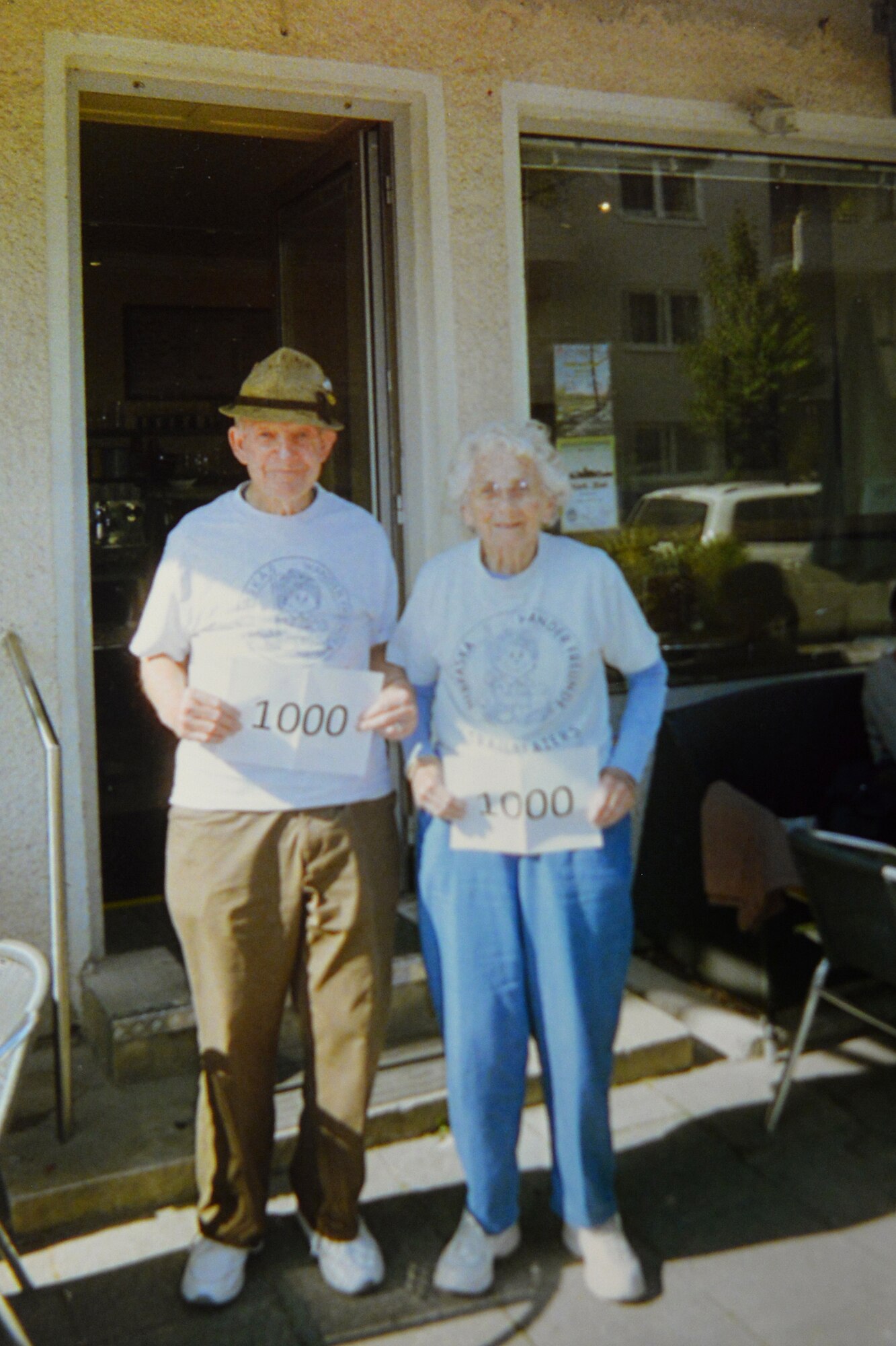 Jim and Sheila Goeltz proudly display paper commemorating their 1,000th Volksmarch on Oct. 1, Munich, Germany.  Volsmarch translates to people's march and is one of the founding activities of the Volkssporting, international community in the late 60s.  (courtesy photo)