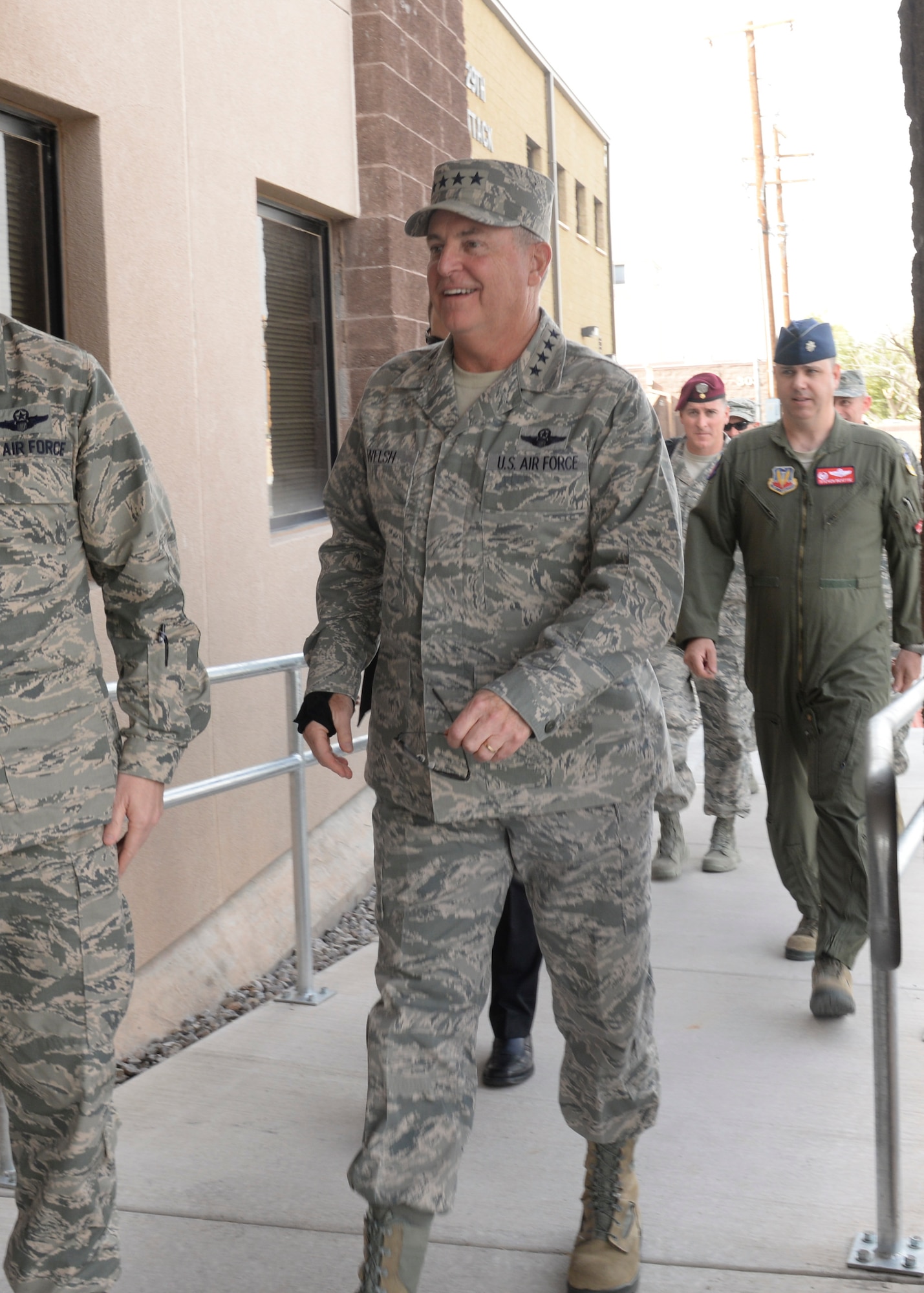 Chief of Staff of the Air Force Gen. Mark A. Welsh III walks into building 318, home of the 9th and 29th Attack Squadrons, at Holloman Air Force Base, New Mexico on Nov. 16. . Welsh’s visit included a tour of the base facilities and the different squadrons here. Welsh held an All-Call at the Domenici Fitness Center at 2:45 p.m., where he spoke about the future plans for the Air Force. (U.S. Air Force Photo by Staff Sgt. E’Lysia A. Wray/Released)