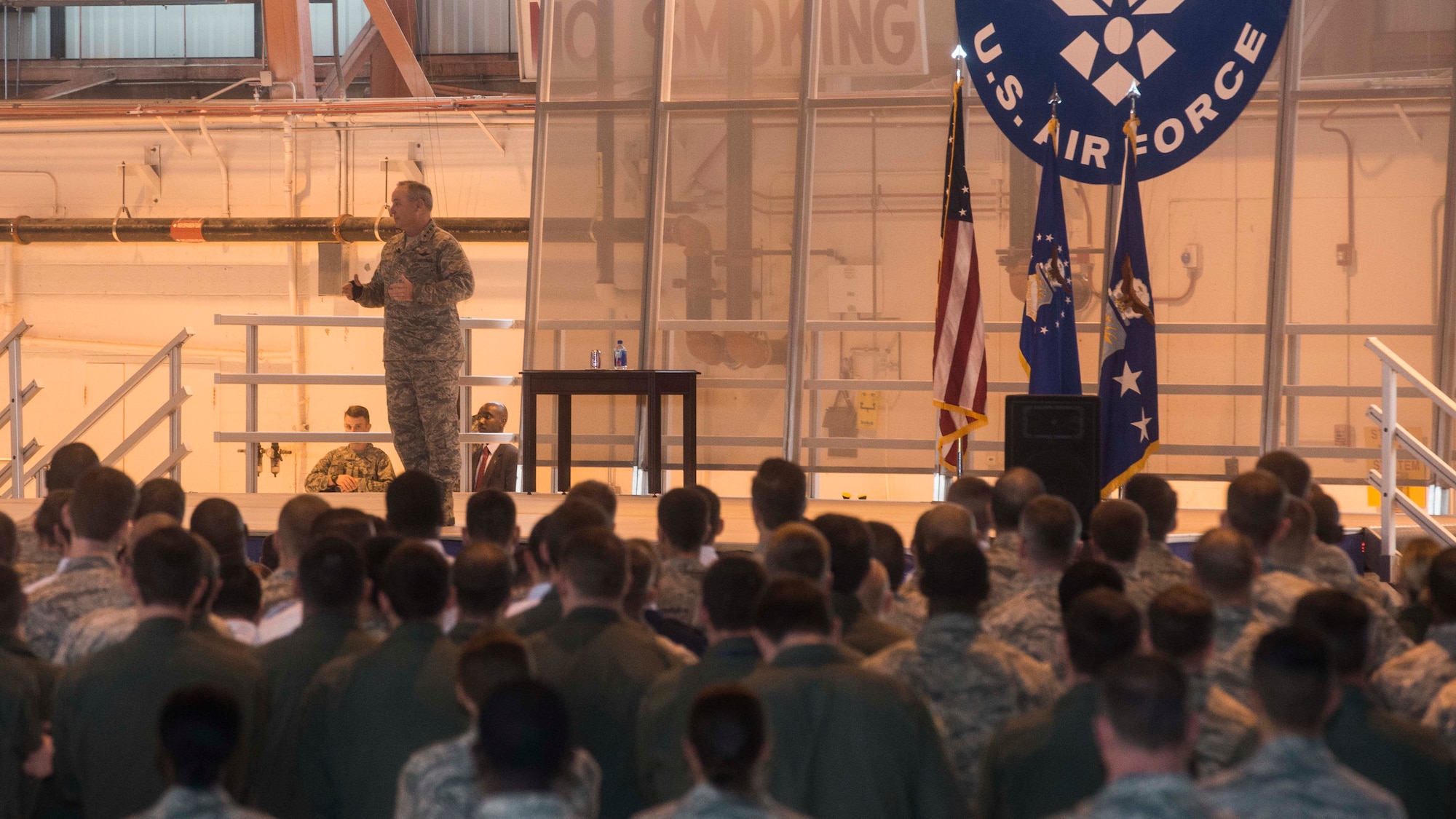 Gen. Mark A. Welsh III, Chief of Staff of the Air Force, speaks to the enlisted and commissioned Airmen at Holloman Air Force Base, N.M., Nov. 16. Welsh’s visit included a tour of the base facilities and the different squadrons here. His all-call focused on future plans for the Air Force, including providing opportunities for the Remotely Piloted Aircraft career fields. (U.S. Air Force photo by Senior Airman Chase Cannon/ Released)