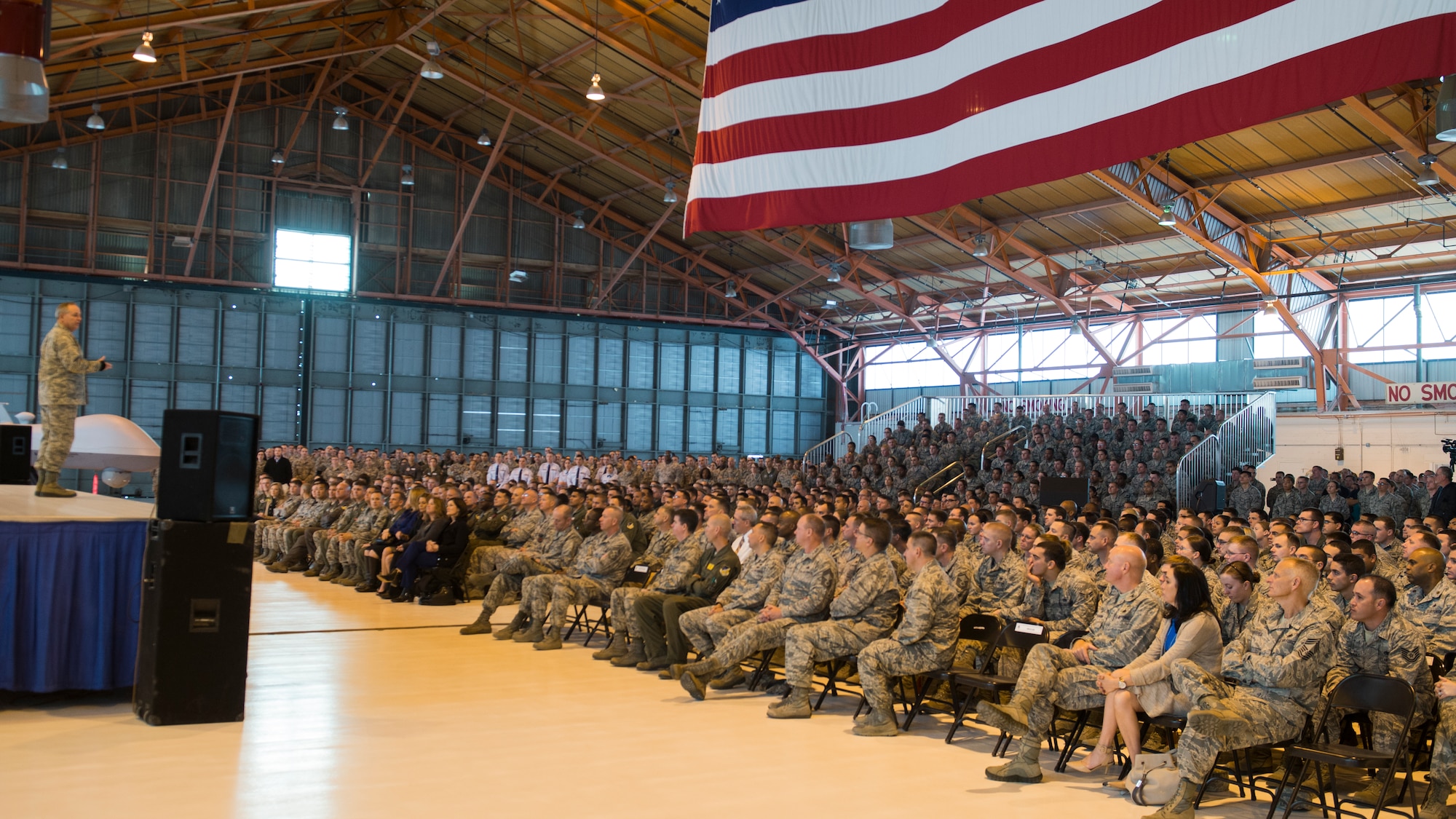 Gen. Mark A. Welsh III, Chief of Staff of the Air Force, speaks to the enlisted and commissioned Airmen at Holloman Air Force Base, N.M., Nov. 16. Welsh’s visit included a tour of the base facilities and the different squadrons here. His all-call focused on future plans for the Air Force, including providing opportunities for the Remotely Piloted Aircraft career fields. (U.S. Air Force photo by Senior Airman Chase Cannon/ Released)