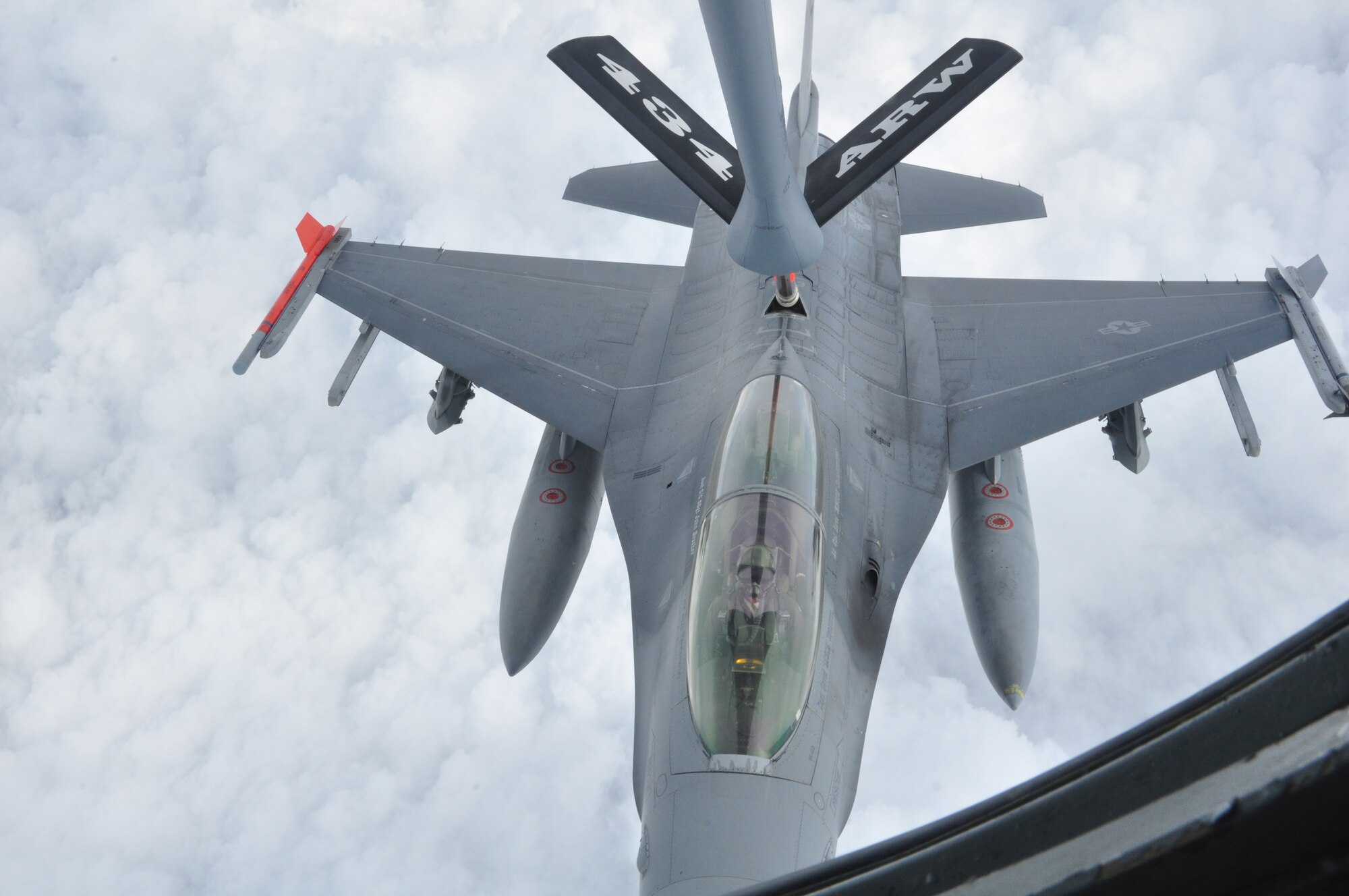 This 301st Fighter Wing F-16 takes in fuel over Texas courtesy of the 434th Air Refueling Wing’s KC-135 out of Grissom ARS, Ind., during a two-day bosslift. In conjunction with the Employer Support for the Guard and Reserve, 20 local civic leaders and employers took part in an adventure to Tyndall AFB, Fla., visiting with the 44th Fighter Group, 325 Fighter Wing and 601st Air Operations Center there. (U.S. Air Force photo/Julie Briden-Garcia)