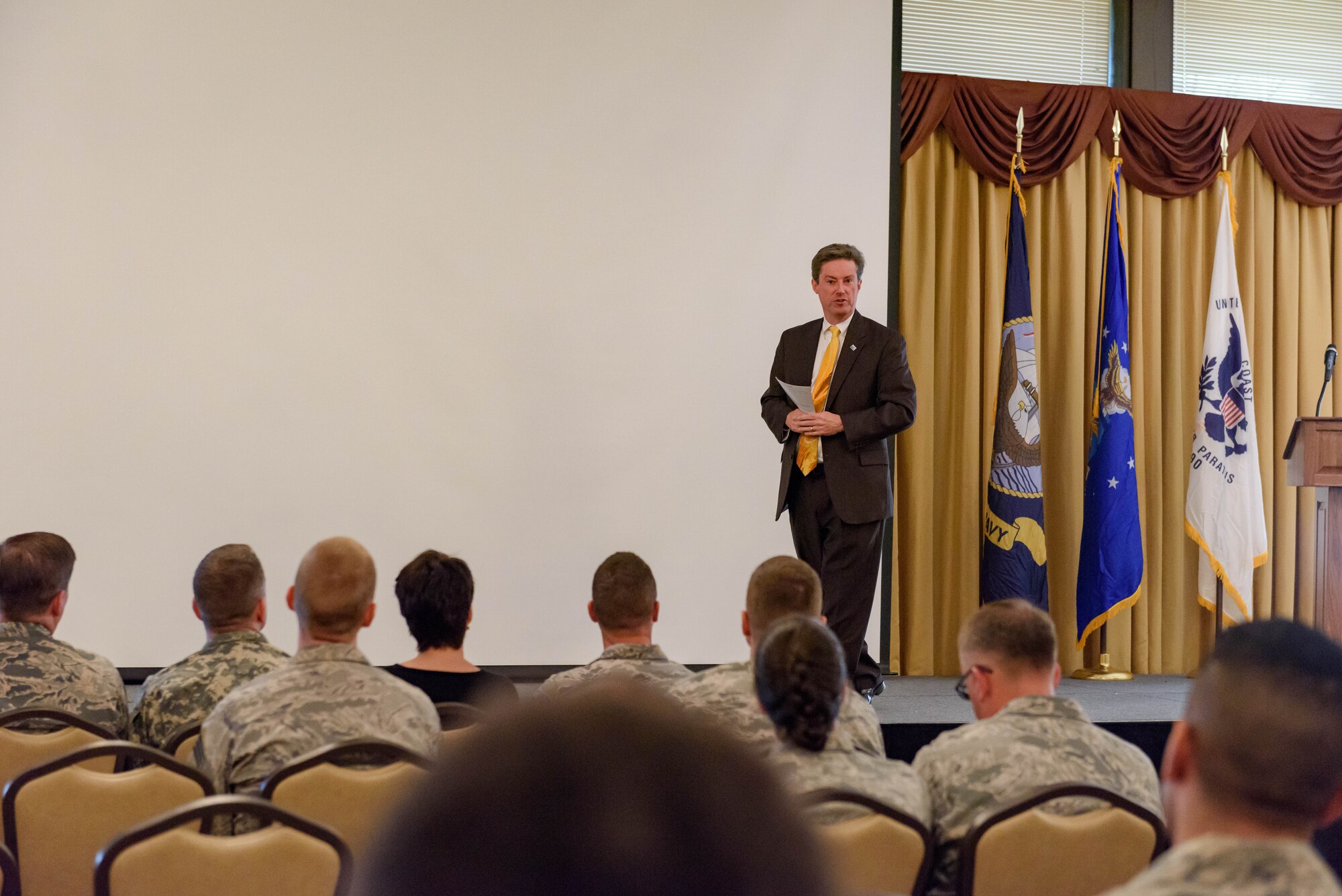 John Emge, United Way of Greater Philadelphia and Southern New Jersey vice president and regional executive director, speaks to members of the joint base community during the Combined Federal Campaign event Nov. 16, 2015 at Joint Base McGuire-Dix-Lakehurst, N.J.  The event, held in the Tommy B's Community Center, helped raise awareness about the annual effort that solicits donations from Federal Employees and supports thousands of charities.  (U.S. Air Force photo by Robert Williard/Released)