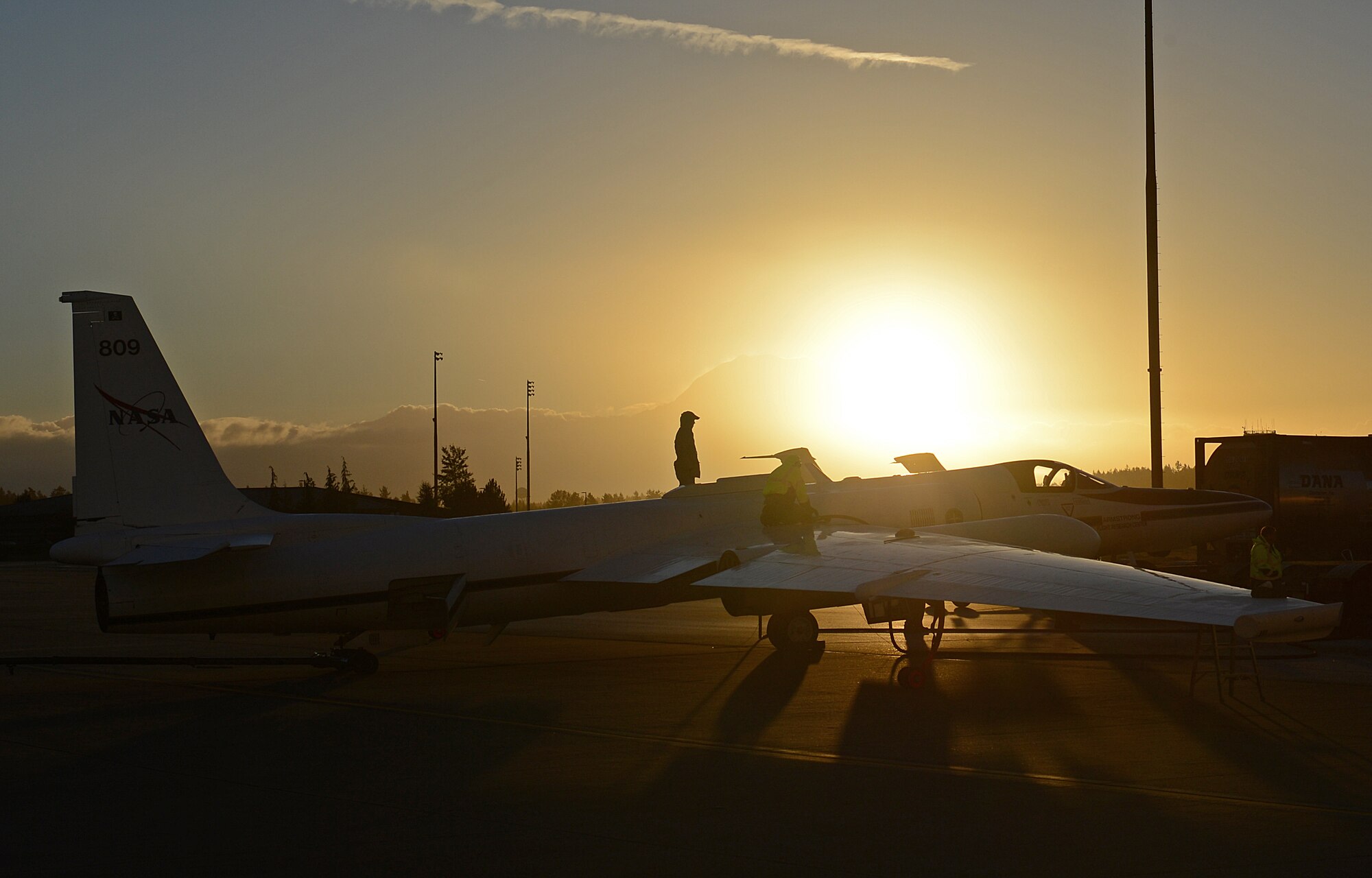 A NASA Lockheed ER-2 aircraft receives fuel prior to taking off Nov. 18, 2015, from Joint Base Lewis-McChord, Wash. NASA operates two Lockheed ER-2 Earth resources aircraft as flying laboratories in the Airborne Science Program under the Agency's Science Mission Directorate. (U.S. Air Force photo/Senior Airman Divine Cox)