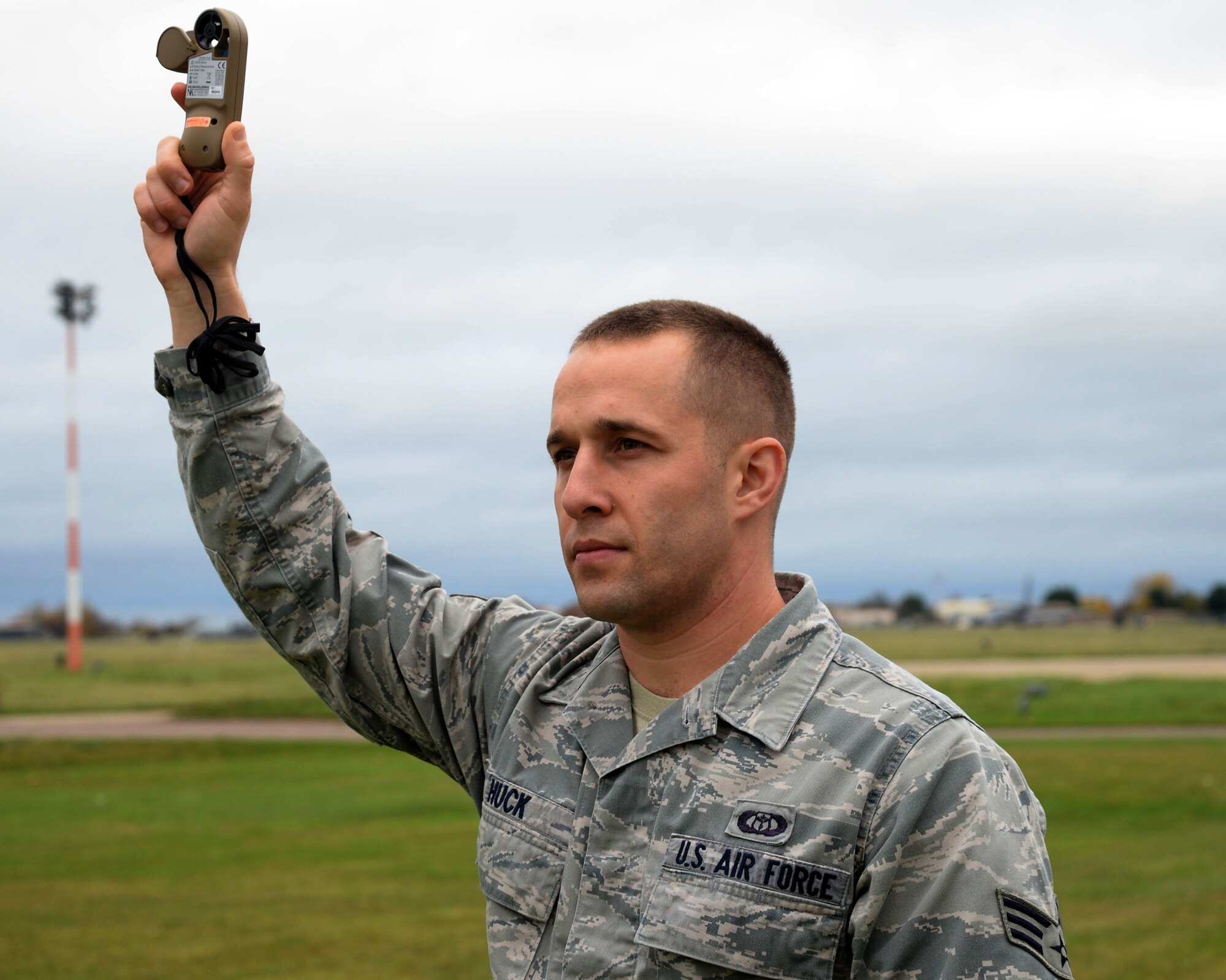 U.S. Air Force Senior Airman Brian Huck, 352nd Special Operations Group weather forecaster, demonstrates the capabilities of a Kestrel 4500 Nov. 10, 2015 on RAF Mildenhall, England. The hand-held weather sensing device measures wind speed, temperature and pressure readings for live weather data. It’s used during manual observations because it can be utilized by a single observer and without the assistance of fixed equipment. (U.S. Air Force photo by Airman 1st Class Justine Rho/Released) 