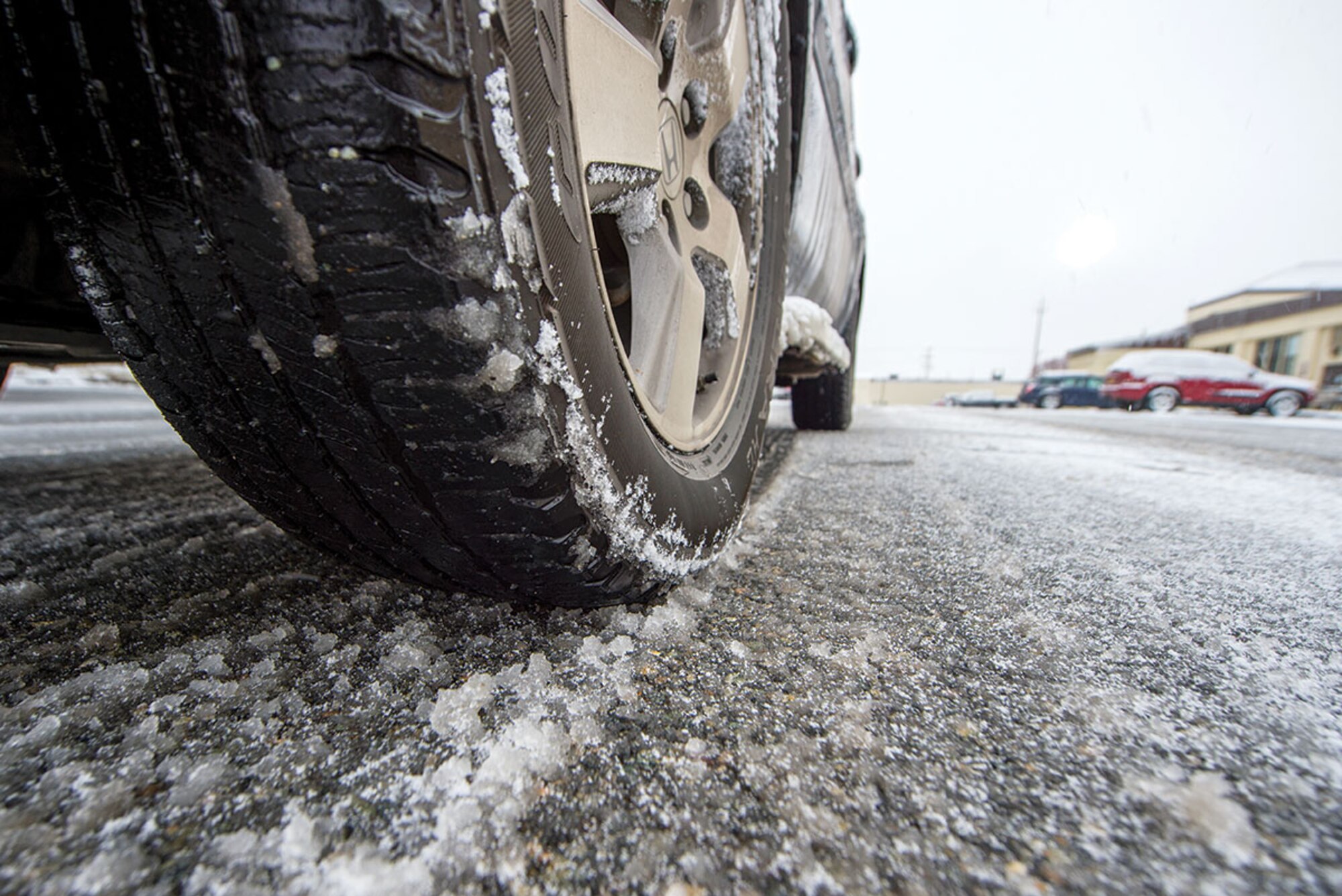 During the winter, arctic warriors and families are reminded to be aware of winter hazards while driving. When winter weather makes driving conditions hazardous Joint Base Elmendorf-Richardson has three reporting options: mission-essential reporting, delayed reporting, and early release, as well as four road condition advisories: green, amber, red and black. (U.S. Air Force photo/Staff Sgt. Sheila deVera)