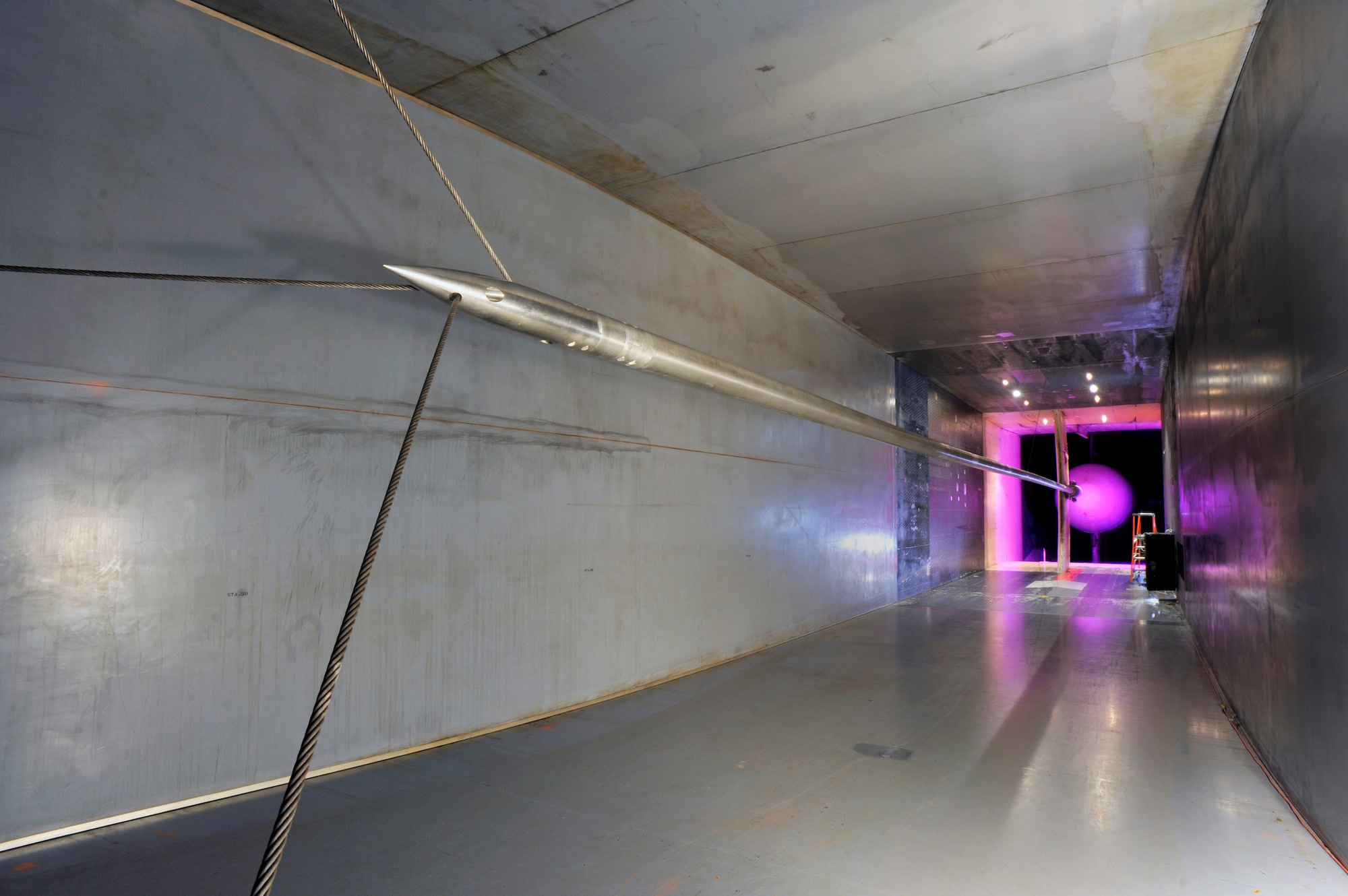 A centerline pipe, pictured here, is used to measure pressure and determine test conditions in the 16-foot transonic wind tunnel at AEDC. According to Michael Mills, wind tunnel performance engineer, this process is known as calibrating the tunnel and takes place every few years to ensure that correct conditions are being simulated in 16T. (Photo by Rick Goodfriend) 