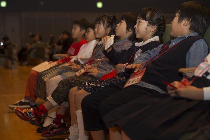 Japanese students wait for their turn to speak at the 54th Annual Japanese and English Speech Contest at the Sinfonia Iwakuni in Iwakuni, Japan, Nov. 8, 2015. Japanese students presented their speeches in English and Matthew C. Perry students delivered theirs in Japanese before a panel of five judges. This contest helps promote a better understanding and friendship between Americans and Japanese.