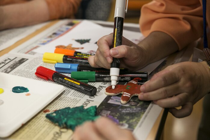 Kaede Nursing Home residents painted Christmas ornaments during the National Honor Society’s visit to the home in Iwakuni Yamaguchi, Japan, Nov. 17, 2015. The National Honor Society students visited this home for the first time in 2014 and were invited to come back again. Events like this show the local community that station residents care about them and want to build bonds.