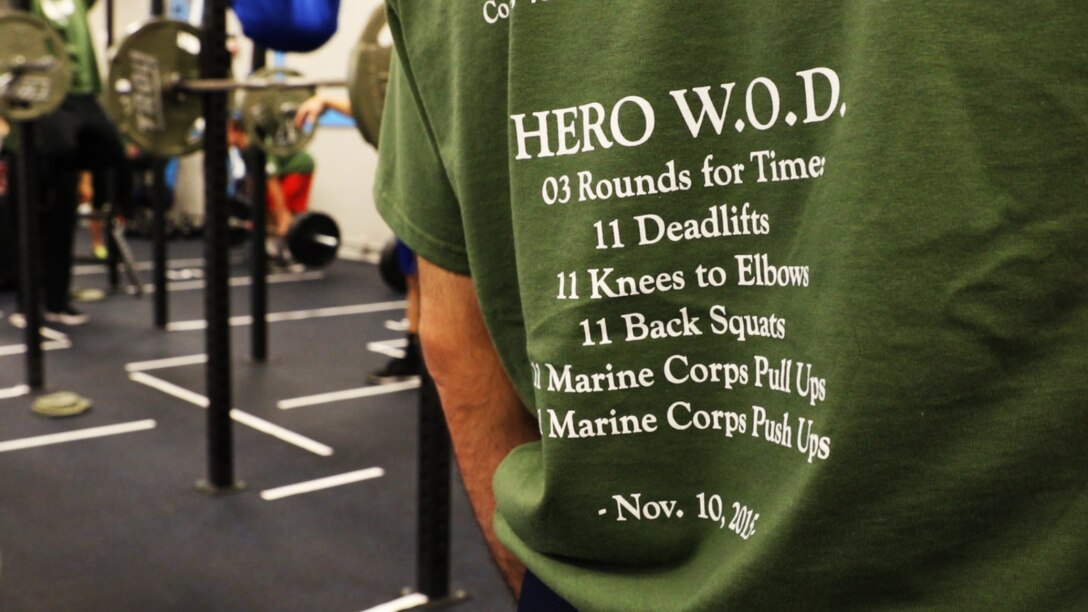 A participant wears the event shirt of the MacDonald Hero Workout event at Iron Empire gym in Dover, New Hampshire, Nov. 10, 2015. Iron Empire hosted a community workout in honor Lance Cpl. MacDonald, a Marine who lost his life in Iraq in 2003, or whomever the participants individually wanted to honor.