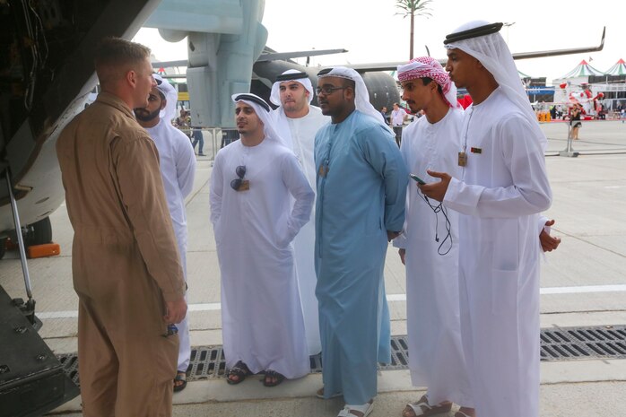 Sgt. Dan Leneghan, a maintenance controller, with the Red Dragons of Marine Medium Tiltrotor Squadron 268, Aviation Combat Element, Special Purpose Marine Air-Ground Task Force Crisis Response Central Command 16.1 showcased some of the unit's aviation capabilities with a group of visitors at the 2015 Dubai Air Show, Dubai World Central, United Arab Emirates from November 8 - 12.
