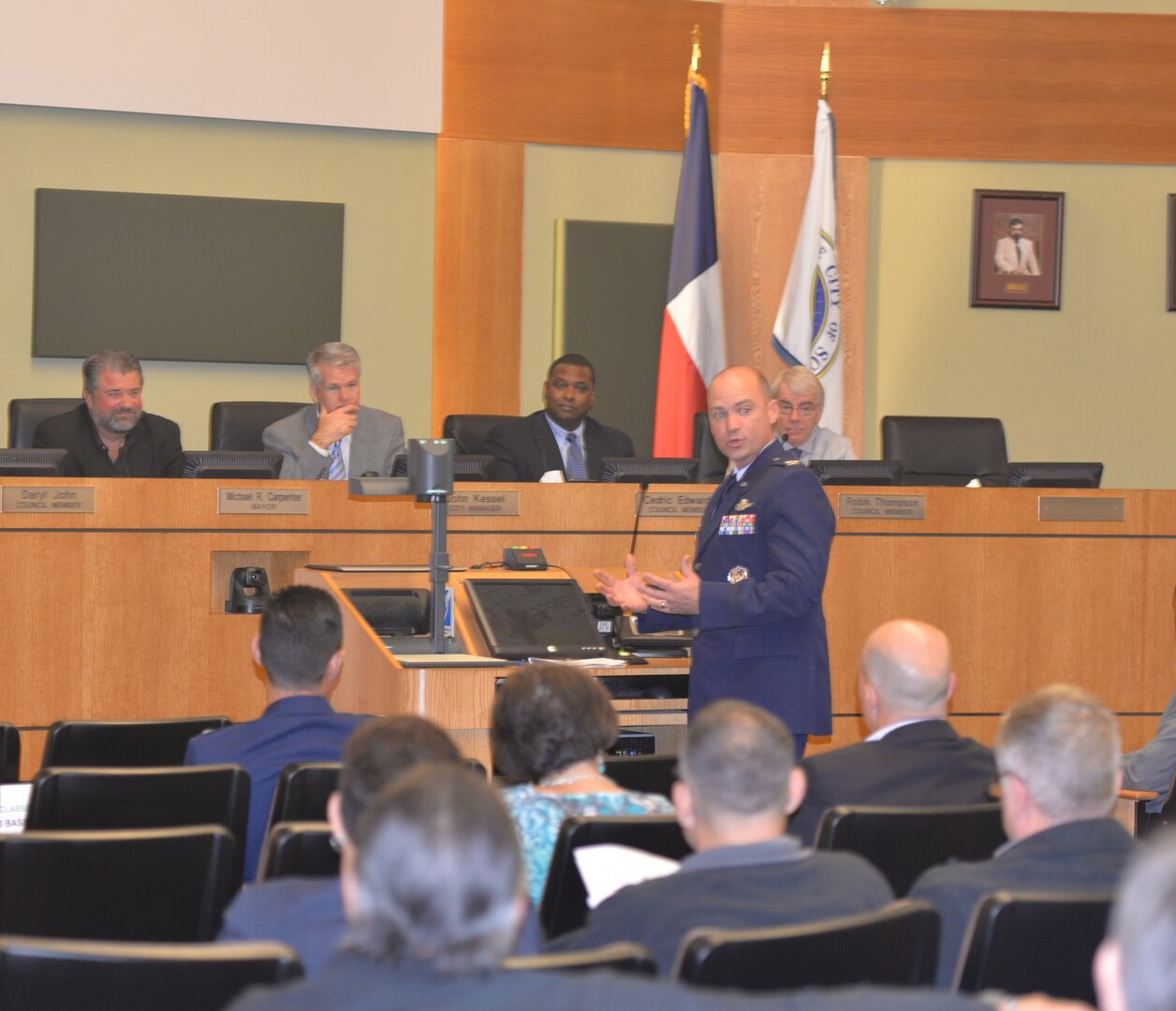 Col. David Drichta, 12th Operations Group commander, thanks the city of Schertz for the community’s support of formal adoption of the Joint Land Use Study during a city council meeting in Schertz, Texas, Nov. 17, 2015.  The study, a joint effort between the military and surrounding community partners focused on finding solutions in mutual areas of concern, such as incompatible development around airfields, was adopted by a 5-0 vote. (U.S. Air Force photo/Randy Martin)