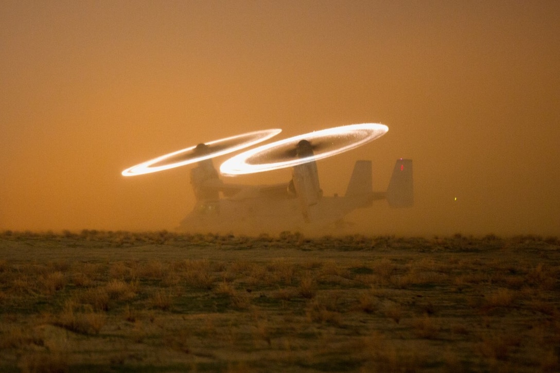 A U.S. Marine Corps MV-22 Osprey assigned to Special Purpose Marine Air-Ground Task Force-Crisis Response-Central Command (SPMAGTF-CR-CC) stages on a hasty landing zone during a tactical recovery of aircraft and personnel (TRAP) drill at an undisclosed location in Southwest Asia, Nov. 16, 2015. SPMAGTF-CR-CC is ready to respond to any crisis response mission in theatre to include the employment of a TRAP force. (U.S. Marine Corps photo by Lance Cpl. Clarence Leake/Released)