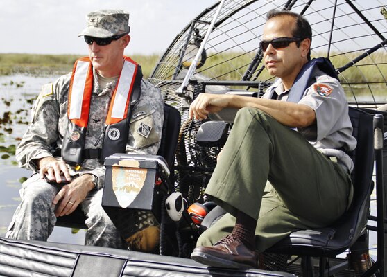 District commander Col. Jason Kirk discusses Everglades water issues with Everglades National Park Superintendent Pedro Ramos.