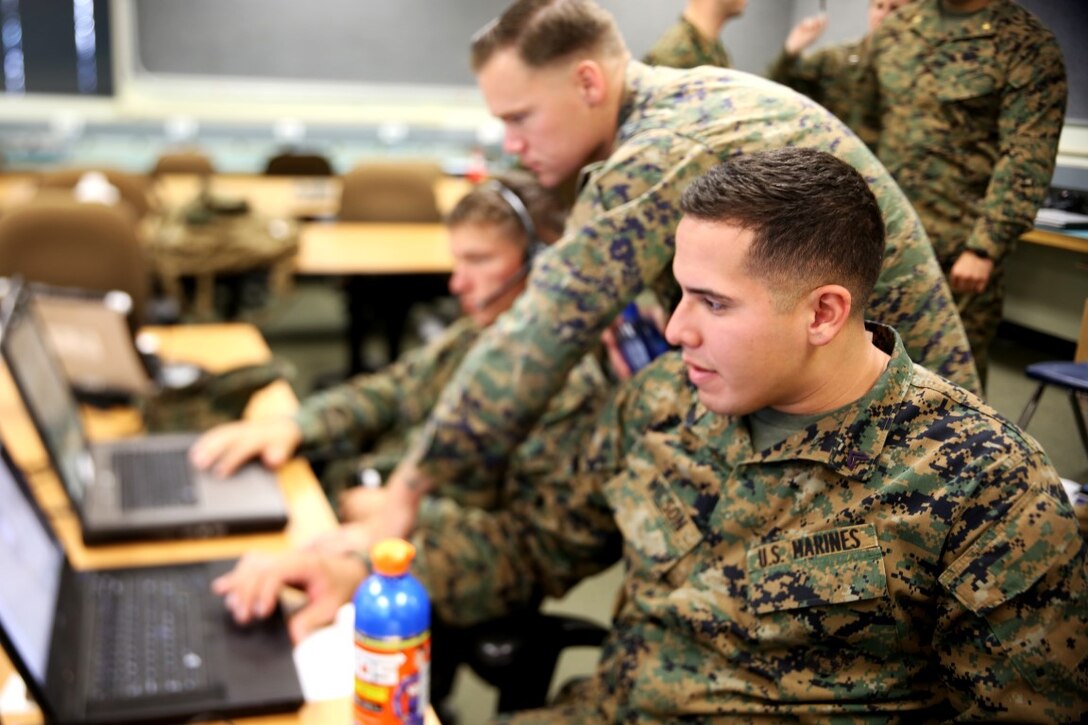 Marines with 1st Marine Division take part in a Combined Armed Staff Trainer exercise aboard Marine Corps Base Camp Pendleton, Calif., Nov. 17, 2015, in preparation for Exercise Steel Knight 2016. The CAST exercise was a division-level evolution, which allowed Marines to maintain designated skillsets in support of a simulated, large-scale operation.(U.S. Marine Corps photo by Cpl. Demetrius Morgan/RELEASED)