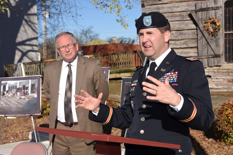 Lt. Col. Stephen Murphy (Right), U.S. Army Corps of Engineers Nashville District commander, speaks in Lebanon Square Nov. 19, 2015 during a signing ceremony for a Flood Risk Management Study of Bartons Creek as Mayor Philip Craighead, Lebanon, Tenn., listens to the colonel.