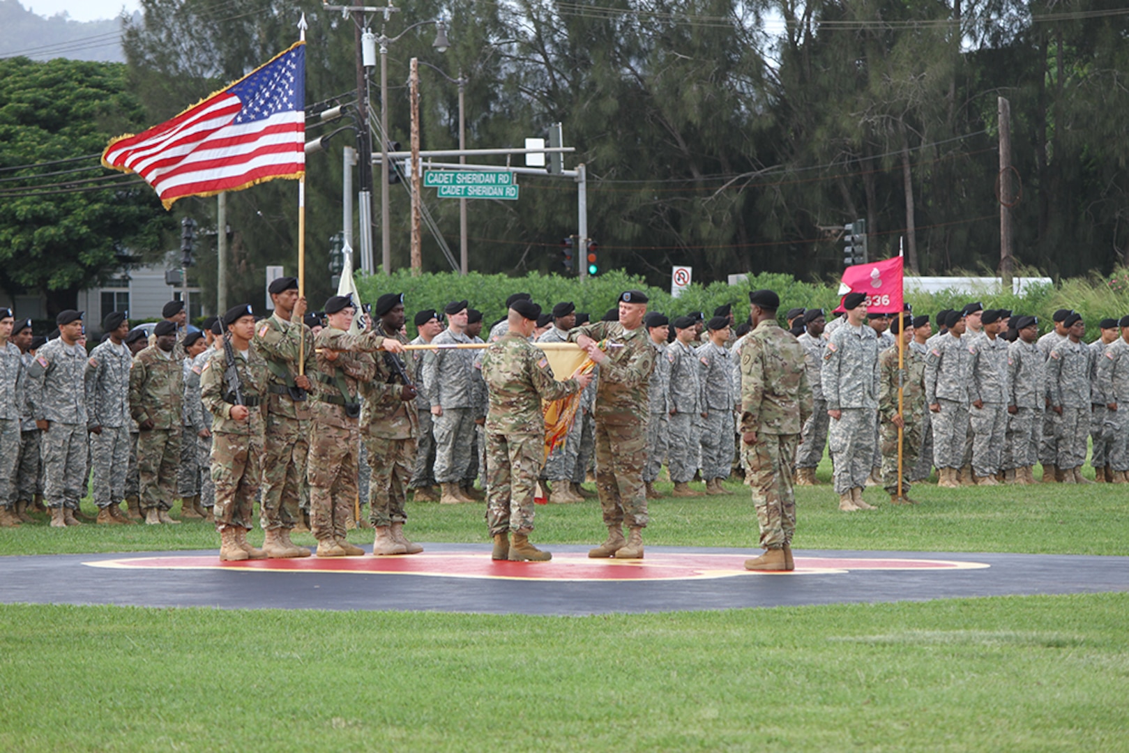 SCHOFIELD BARRACKS, Hawaii (Nov. 17, 2015) - Col. Gavin Lawrence, commander of the 25th Sustainment Brigade, Lt. Col. Donald Logsdon, commander of the 524th Combat Sustainment Support Battalion, and Maj. Matthew Day of the 524th CSSB prepare to case the unit colors during a casing ceremony at Watts Field.  The battalion will deploy to Kuwait in support of Operation Spartan Shield at the end of November. 