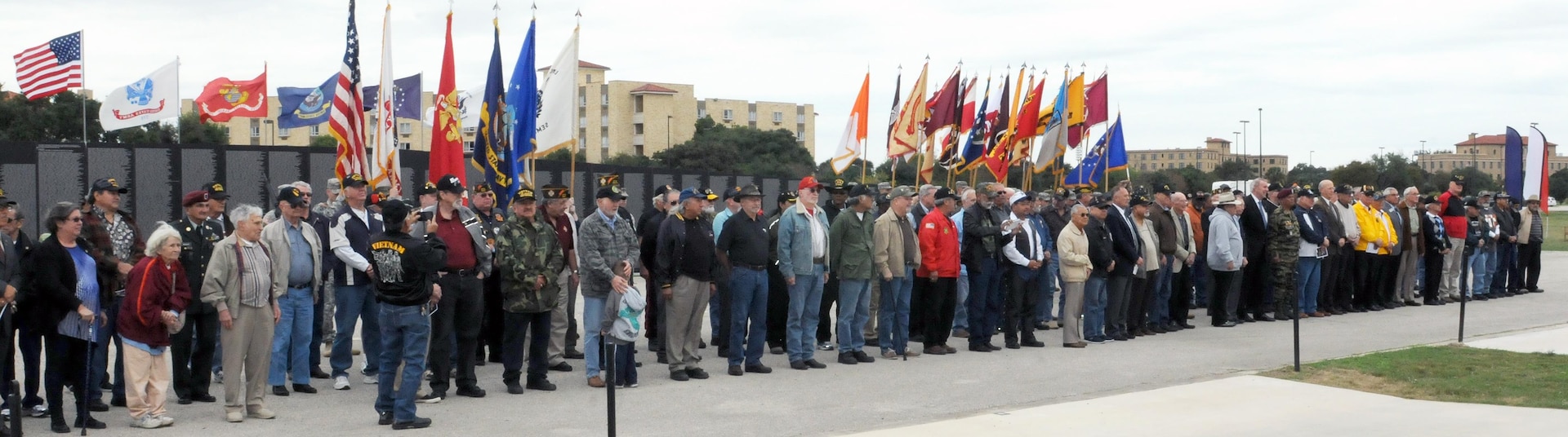 Vietnam veterans from all braches of military service line up to be recognized during the “Salute To Veterans” event at MacArthur Field on Fort Sam Houston Friday.