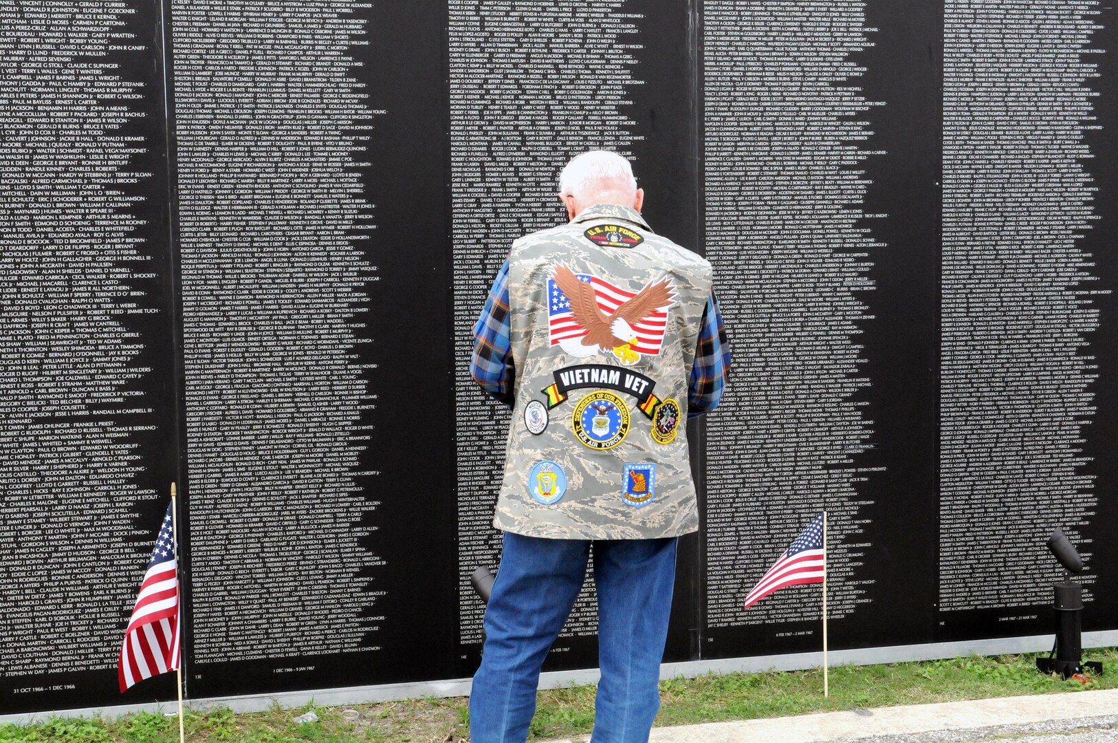 The ceremony's backdrop was the traveling Vietnam Memorial Wall presented by the American Veterans Traveling Tribute.