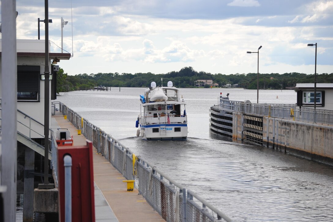A boat departs after locking through W.P. Franklin Lock & Dam near Fort Myers. District lock and dam operators locked through more than 42,000 vessels last year.